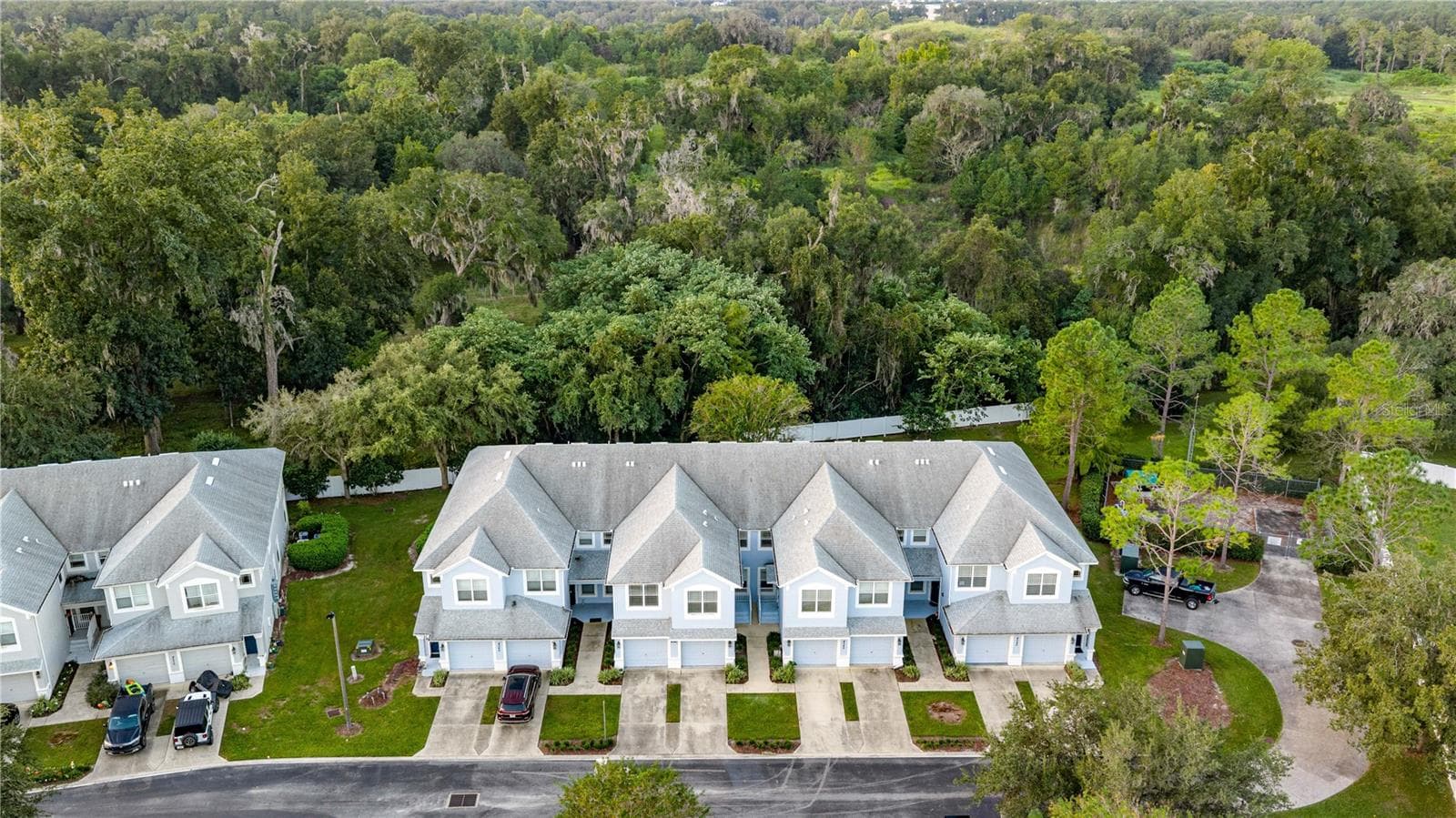 Surrounded by a backdrop of trees - 4540 SW 52ND CIR #104, OCALA