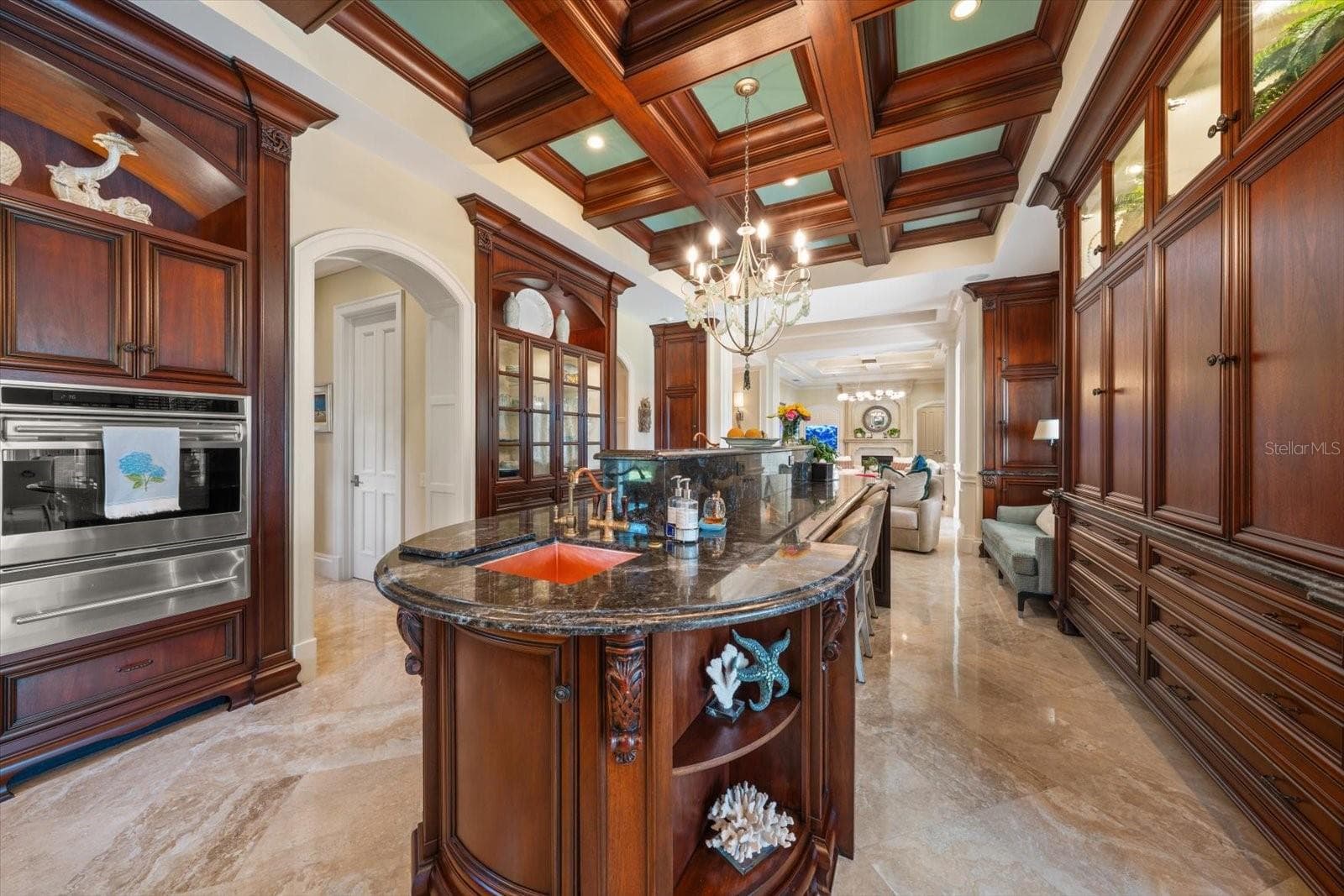 Impressive 13-foot island with two copper sinks - 2056 COVE TRCE, PALM HARBOR