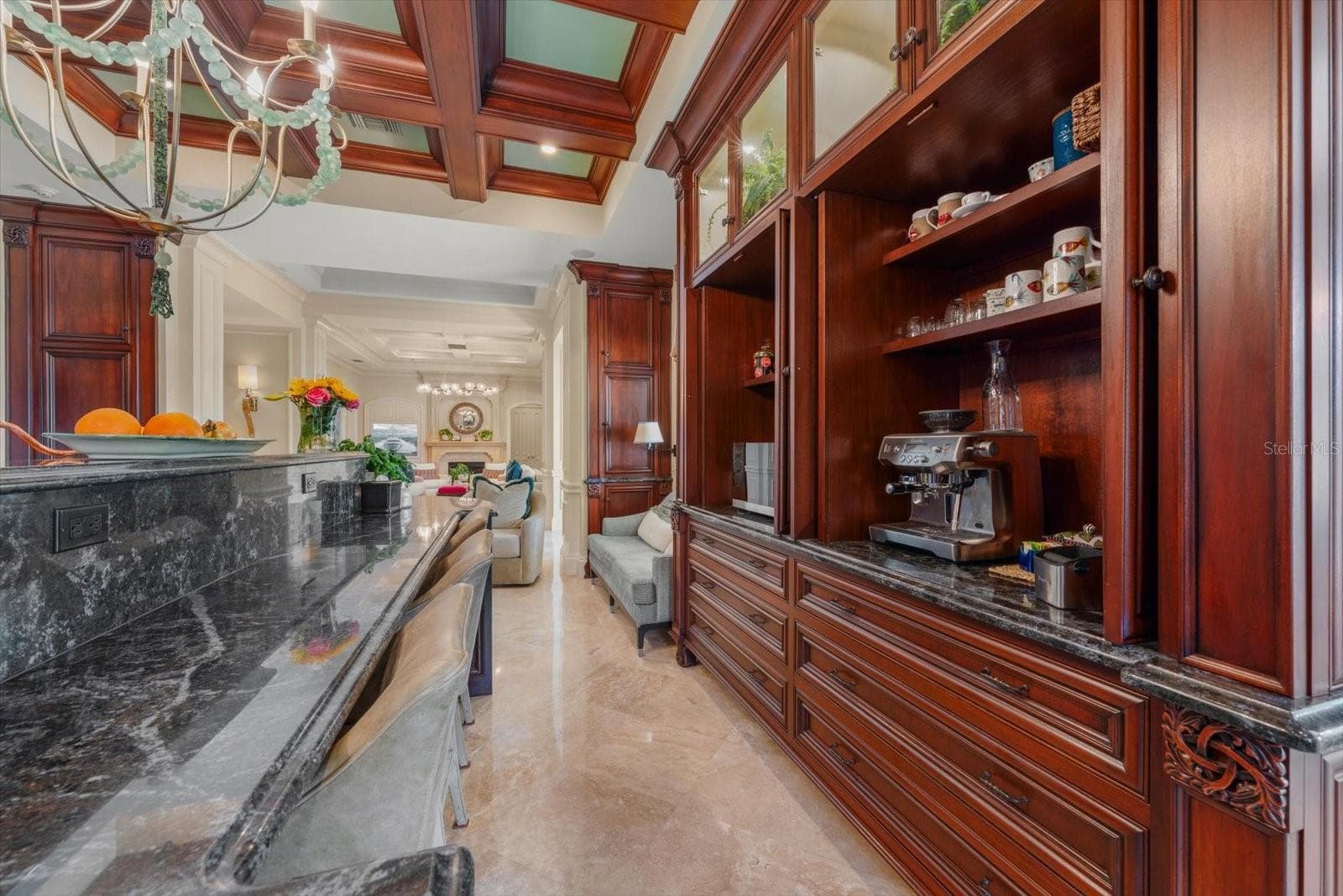 Floor-to-ceiling “Furniture Style” Solid-Wood Cabinetry! Keep them opened for easy access, or close them off while entertaining! - 2056 COVE TRCE, PALM HARBOR