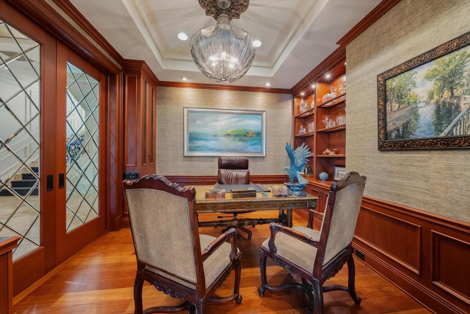Beautifully Appointed and Centrally Located Executive Office with Built-in Shelving and Tray Ceilings - 2056 COVE TRCE, PALM HARBOR