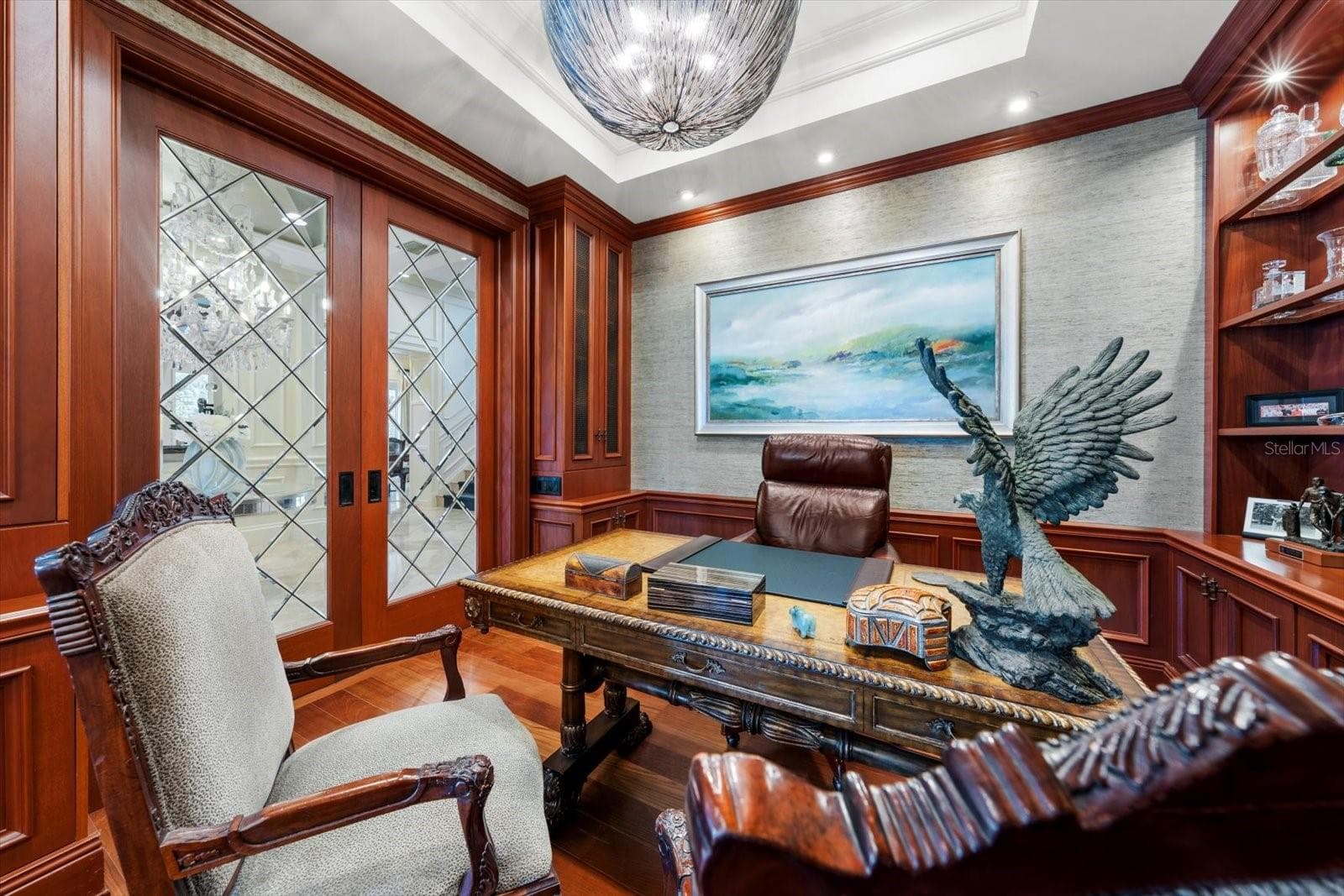 The details in the office are unmatched! Gorgeous Lead-Glass Pocket Sliders - 2056 COVE TRCE, PALM HARBOR