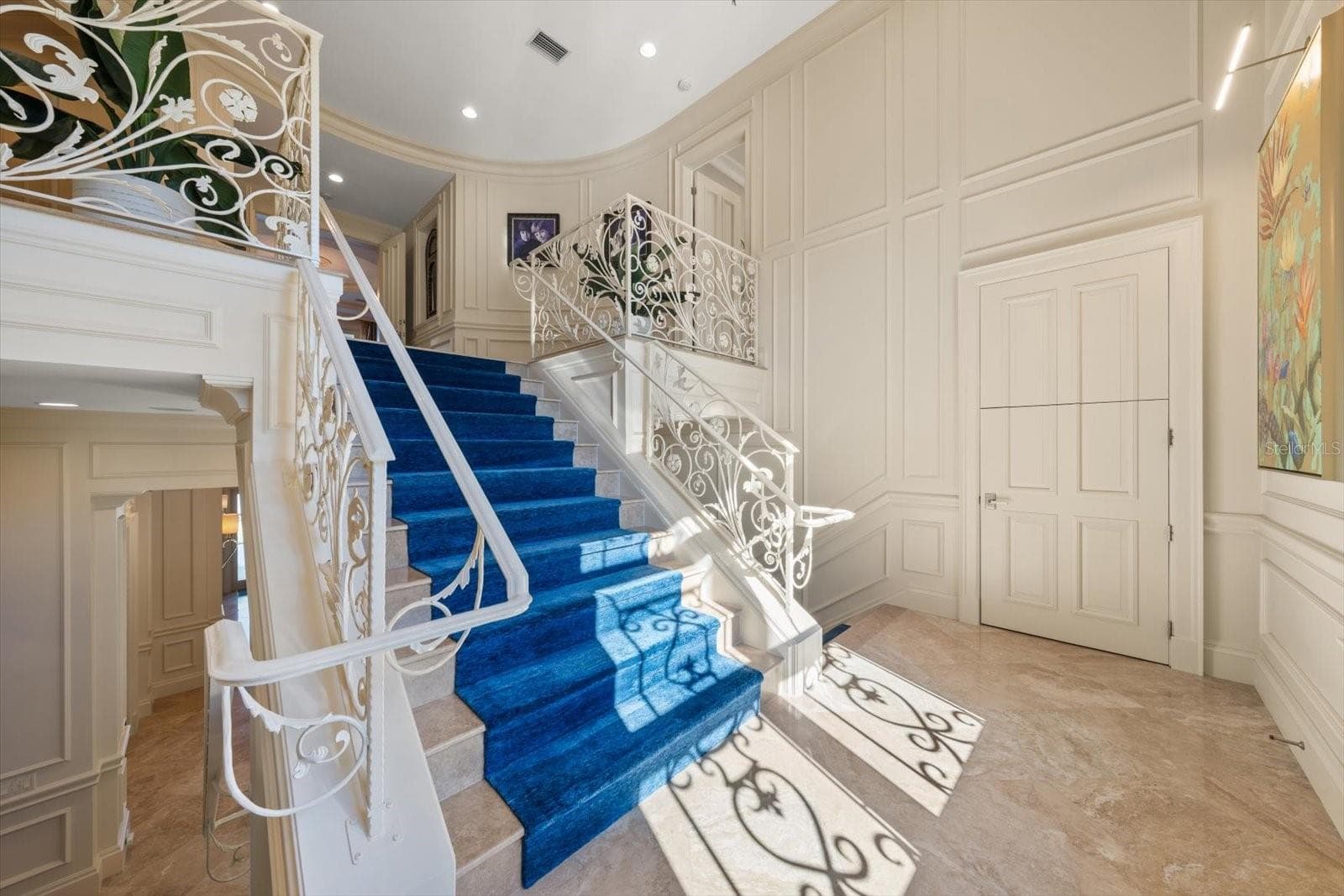 There are two large and separate storage closets at both ends of this landing - 2056 COVE TRCE, PALM HARBOR