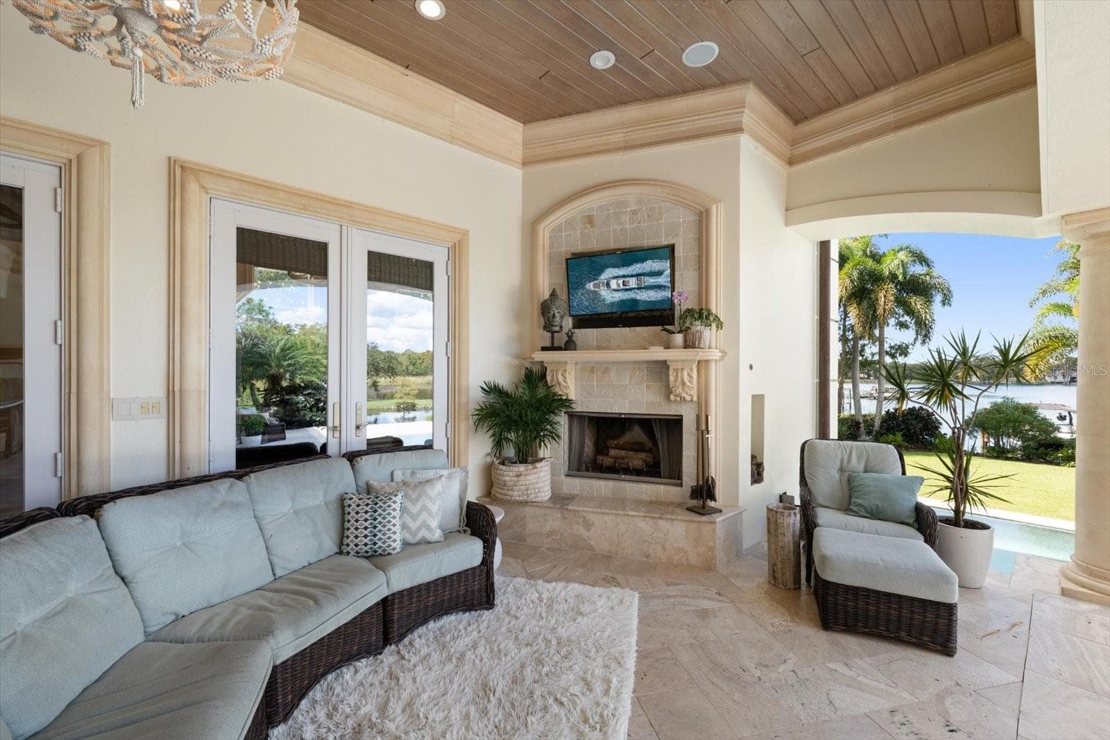 Wood clad ceiling with precast stone crown molding - 2056 COVE TRCE, PALM HARBOR