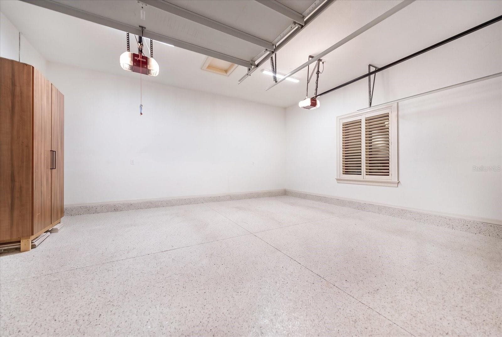 2 x 2 Car Garages! Both are side entry garages adding to the Luxurious Elevation Setting - 2056 COVE TRCE, PALM HARBOR