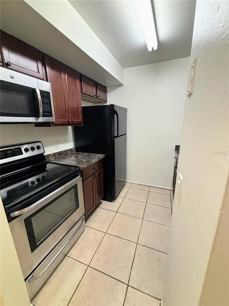 Kitchen Left - 14417 HANGING MOSS CIR #102, TAMPA