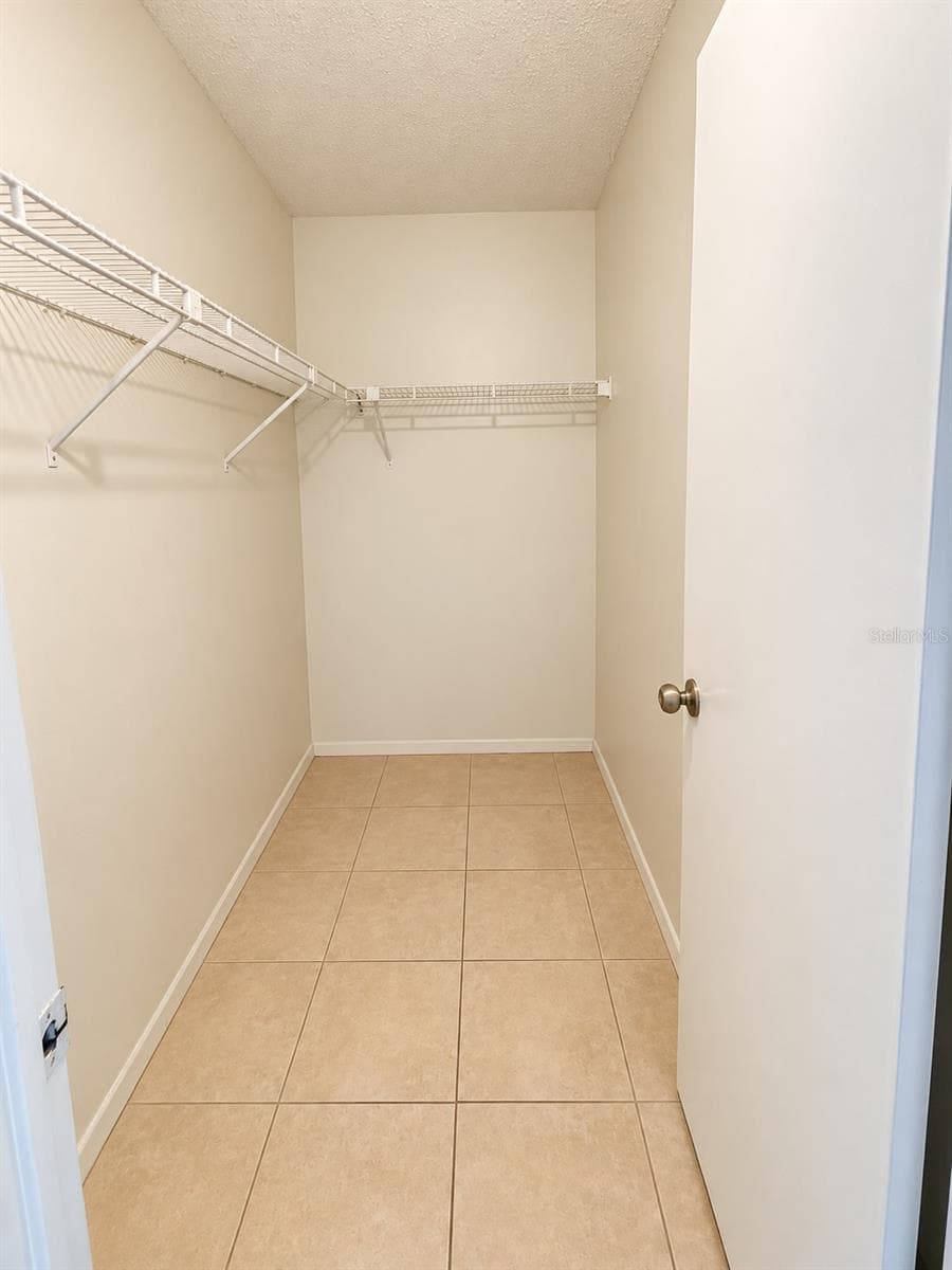 Primary Closet - 14417 HANGING MOSS CIR #102, TAMPA