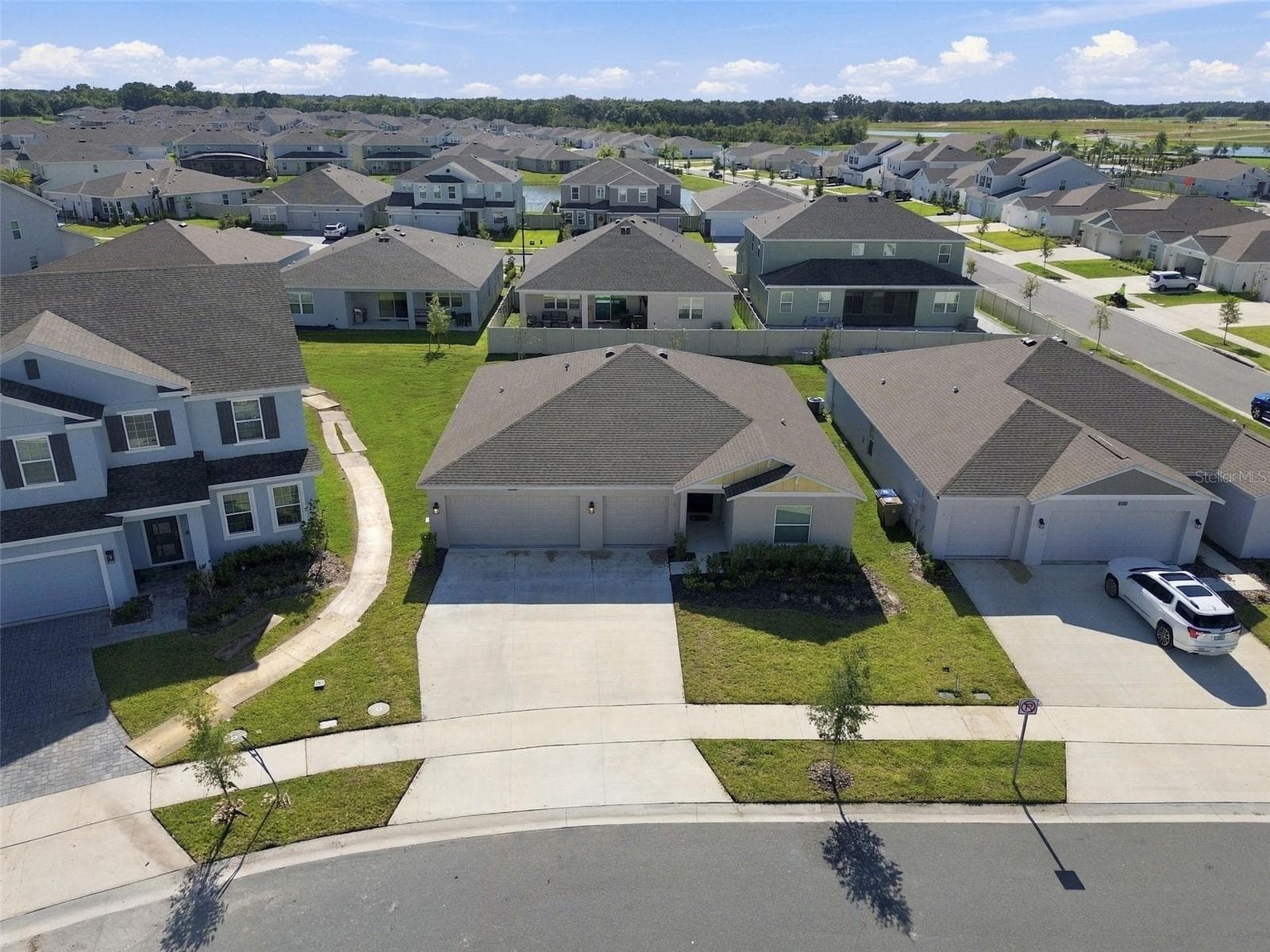 Built in 2025, this 3-bedroom, 2-bath home features a 3-car garage, an open-concept layout, and neutral finishes throughout. - 2007 FORAGE DR, KISSIMMEE