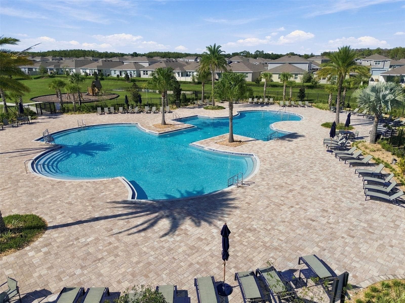 Storey Creek residents enjoy an array of amenities, including a resort-style pool, fitness center, clubhouse, tennis and basketball courts, volleyball court, playground, and walking trails. The low monthly HOA of $181 includes lawn maintenance. - 2007 FORAGE DR, KISSIMMEE