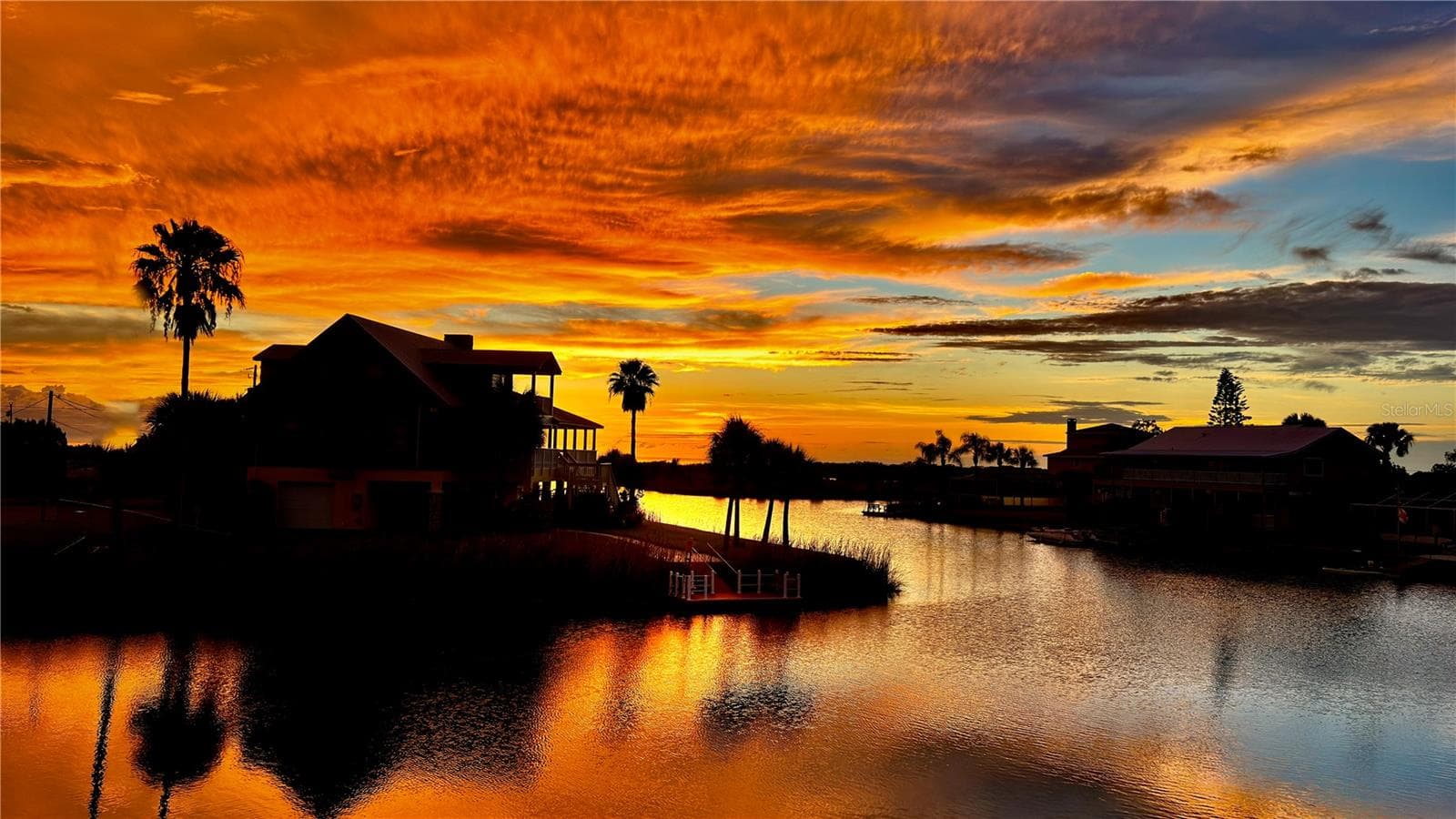 Professional photo of actual sunset from back deck - 3425 CRAPE MYRTLE DR, HERNANDO BEACH