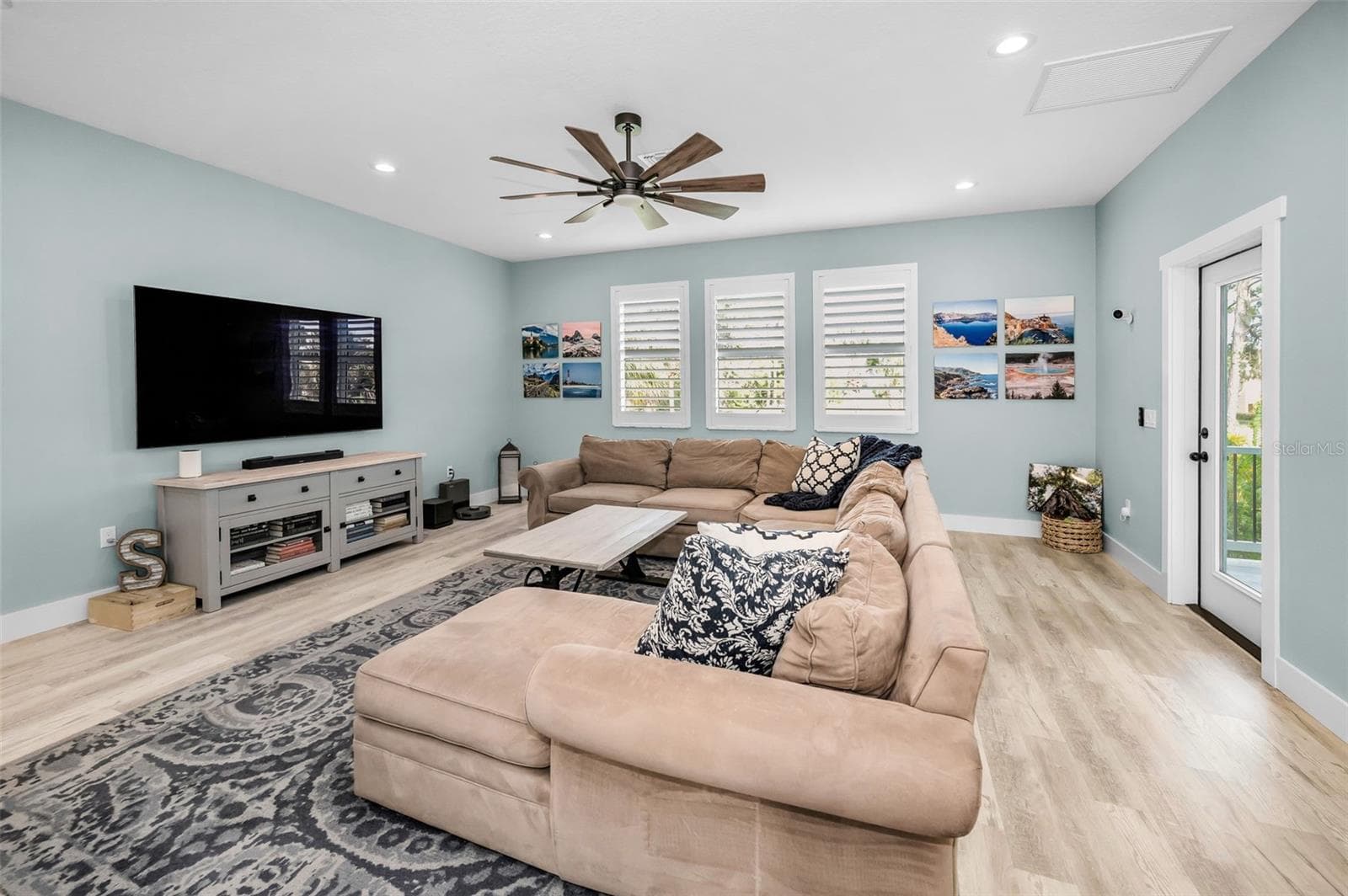 Great room - love the plantation shutters! - 5650 EGRETS PL, NEW PORT RICHEY