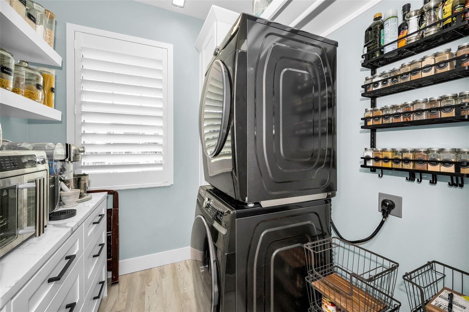 Laundry and Pantry room is just off the kitchen - 5650 EGRETS PL, NEW PORT RICHEY
