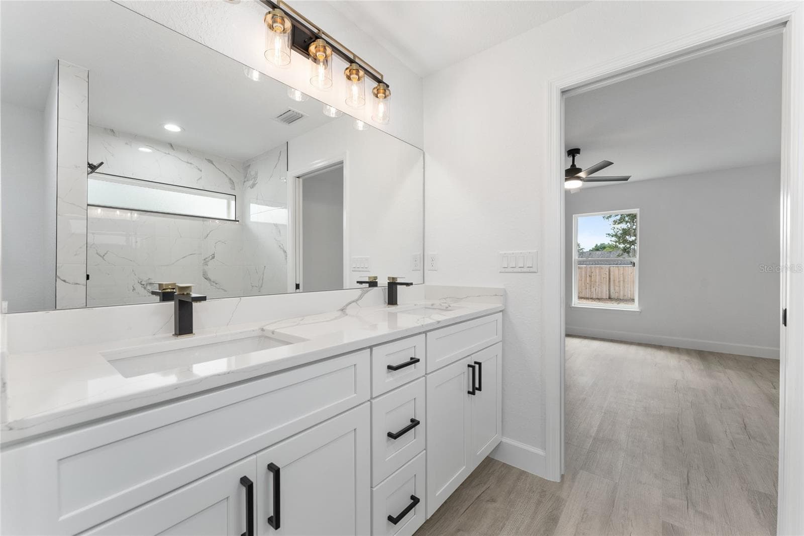 Primary Bathroom. Actual home will not have gold finishes, only black - 3 PECAN DRIVE TRCE, OCALA