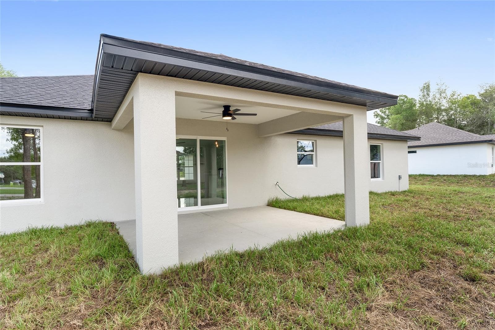 Covered back porch - Model Home Example - 3 PECAN DRIVE TRCE, OCALA