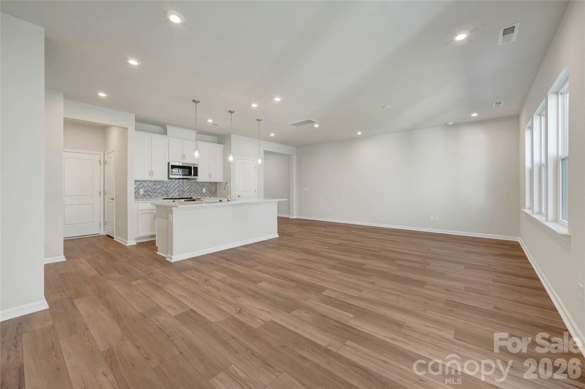 Open concept first floor with ample natural light - 709 Bowery Place, Cramerton