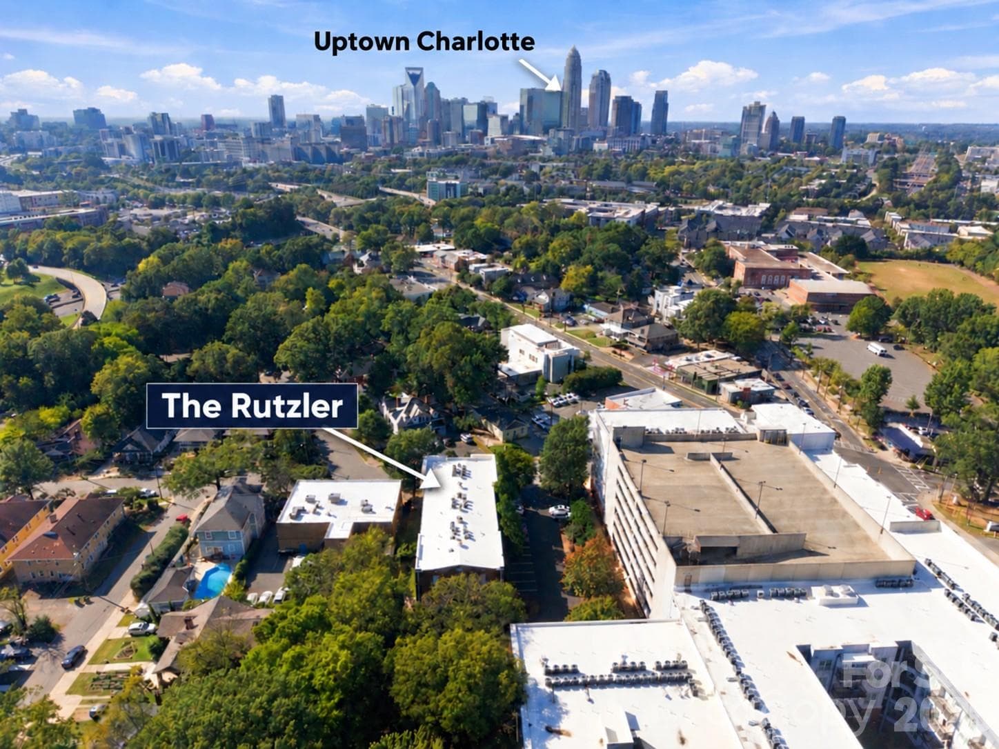 Uptown is closer than you think - enjoy the neighborhood charm at The Rutzler with Charlotte’s city center just a short drive away. Aerial view. - 712 Louise Avenue, Charlotte