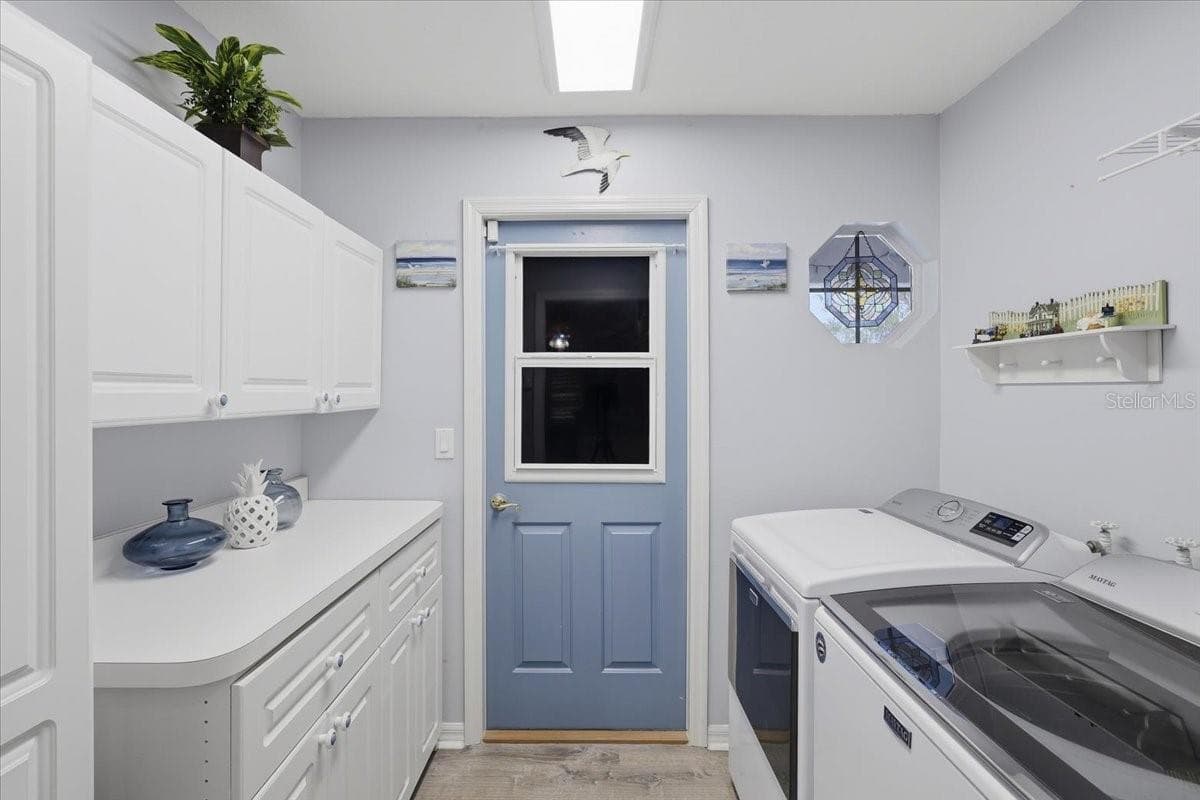 LAUNDRY ROOM WITH STORAGE - 3 RYMM PL, PALM COAST