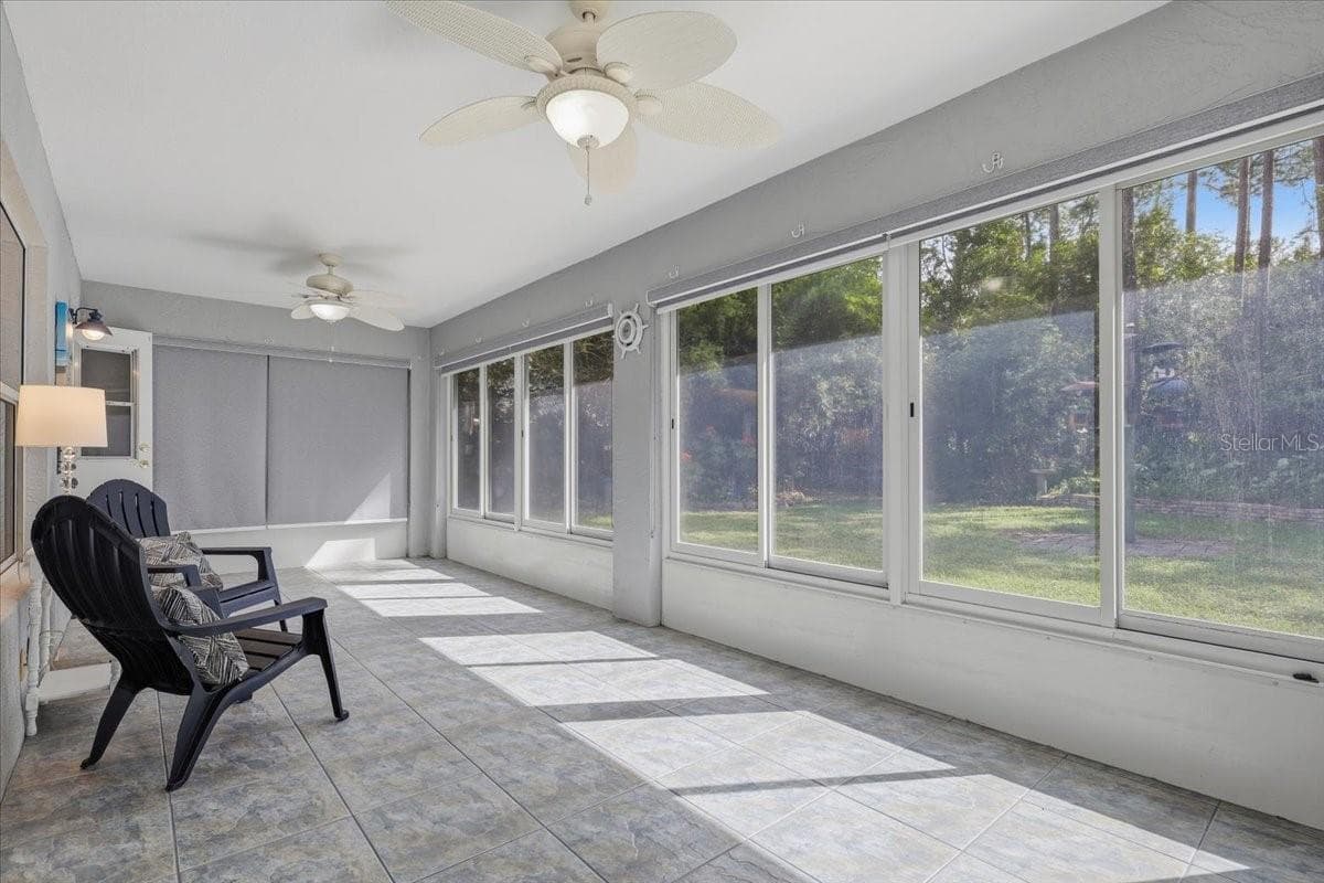 ENCLOSED FLORIDA ROOM VIEW - 3 RYMM PL, PALM COAST
