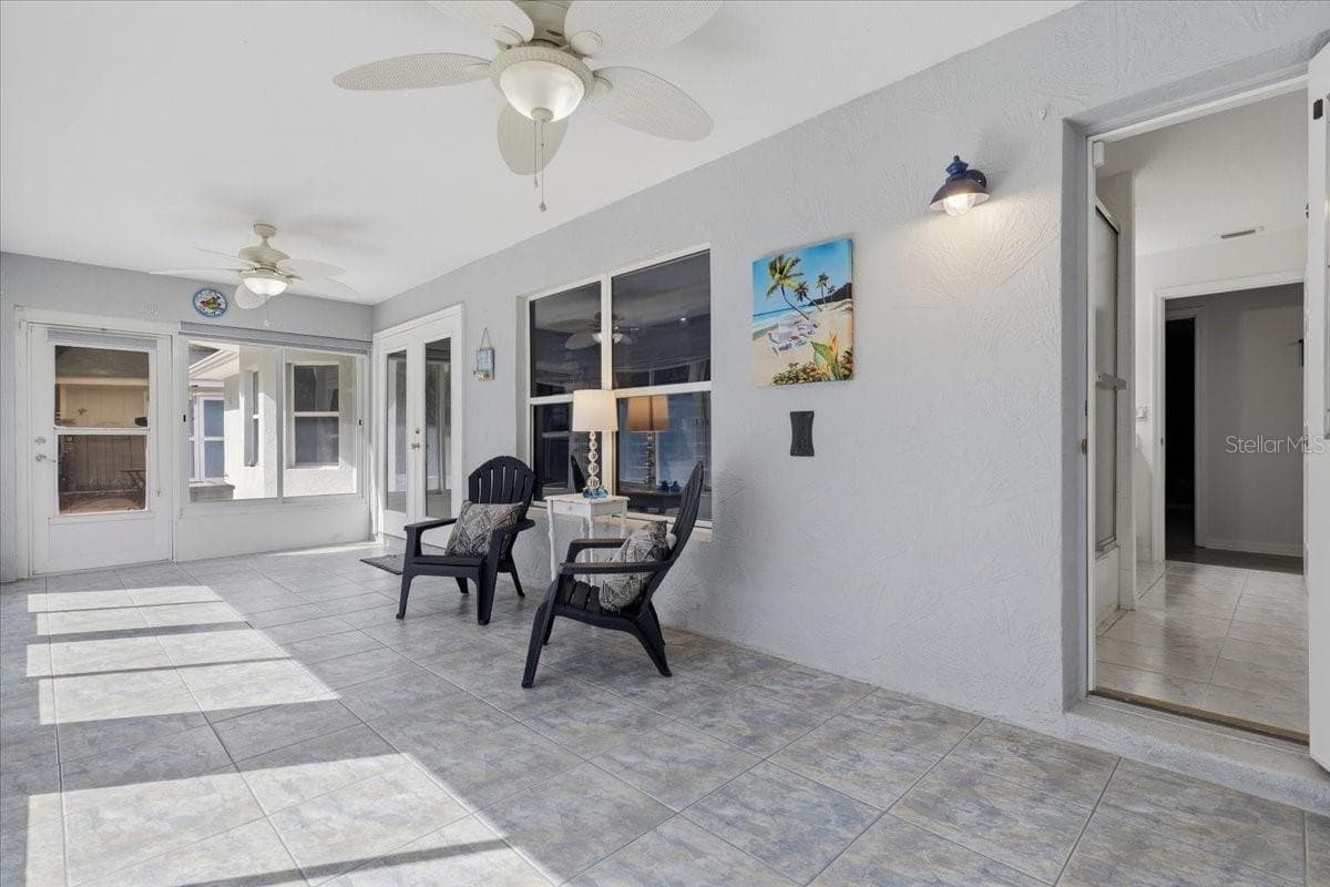 ENCLOSED FLOORIDA ROOM - 3 RYMM PL, PALM COAST