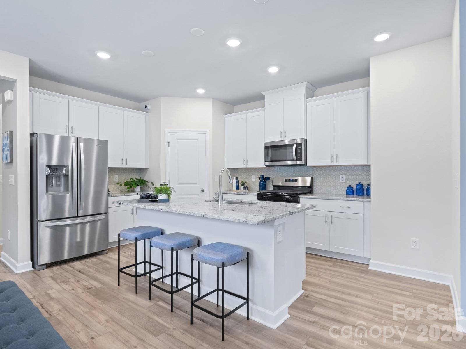 Photo is not of the actual home, but is an inspirational photo of builder’s model home and may depict options, furnishings, and/or decorator features that are not included - 12511 Russellwood Lane, Charlotte