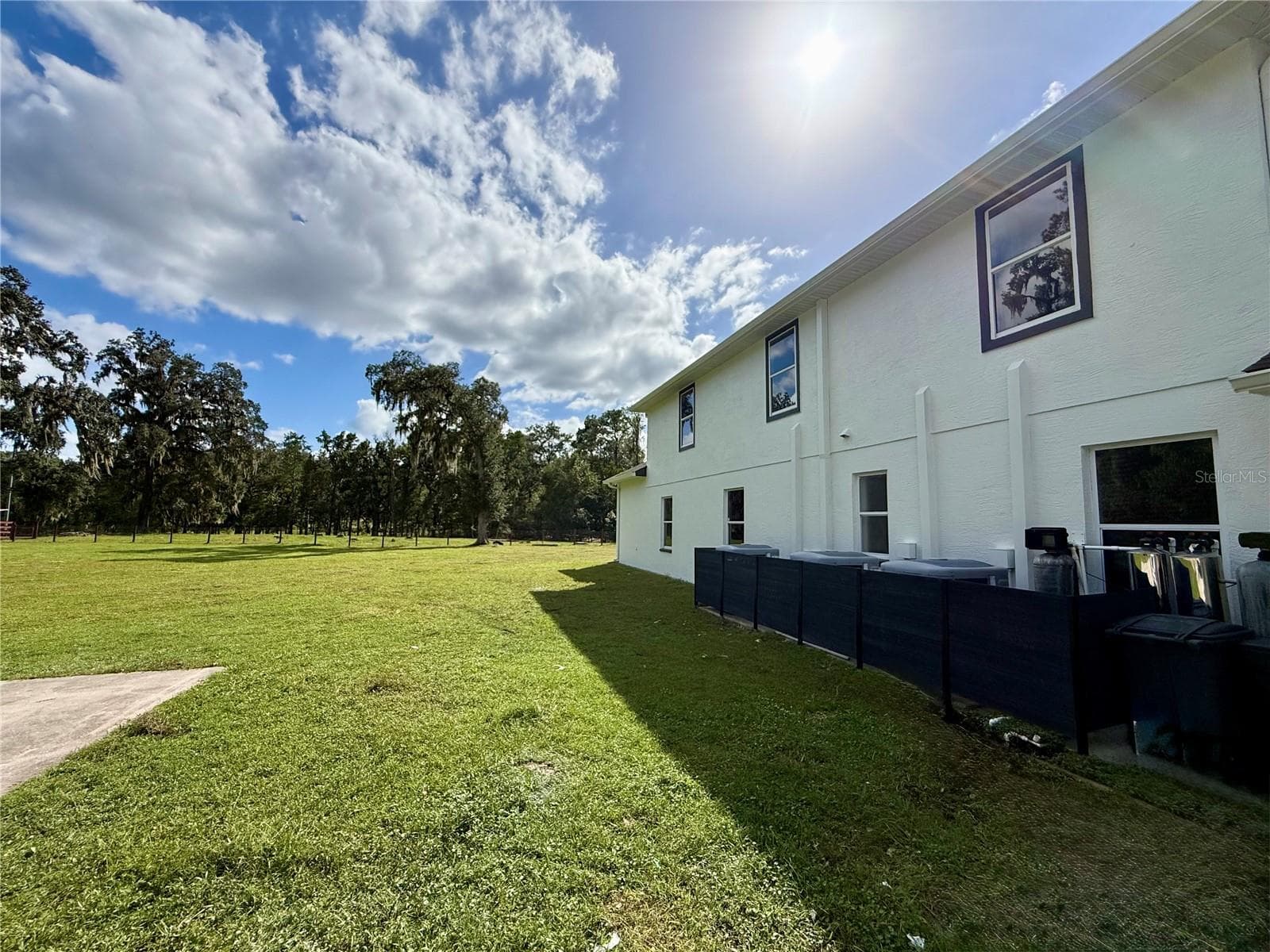 Left side of the house - 25406 LADYHAWK LN, BROOKSVILLE