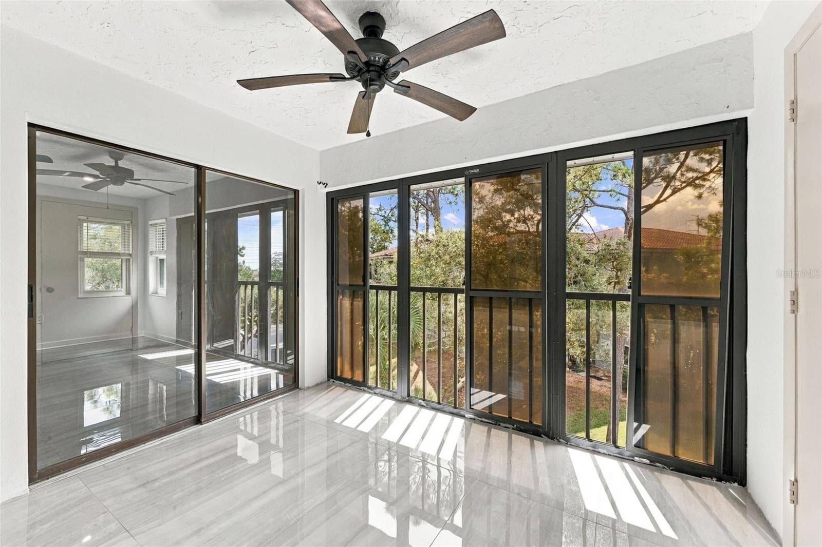 Private back patio perfect for relaxing and enjoying the outdoors - 2650 COUNTRYSIDE BLVD #A306, CLEARWATER