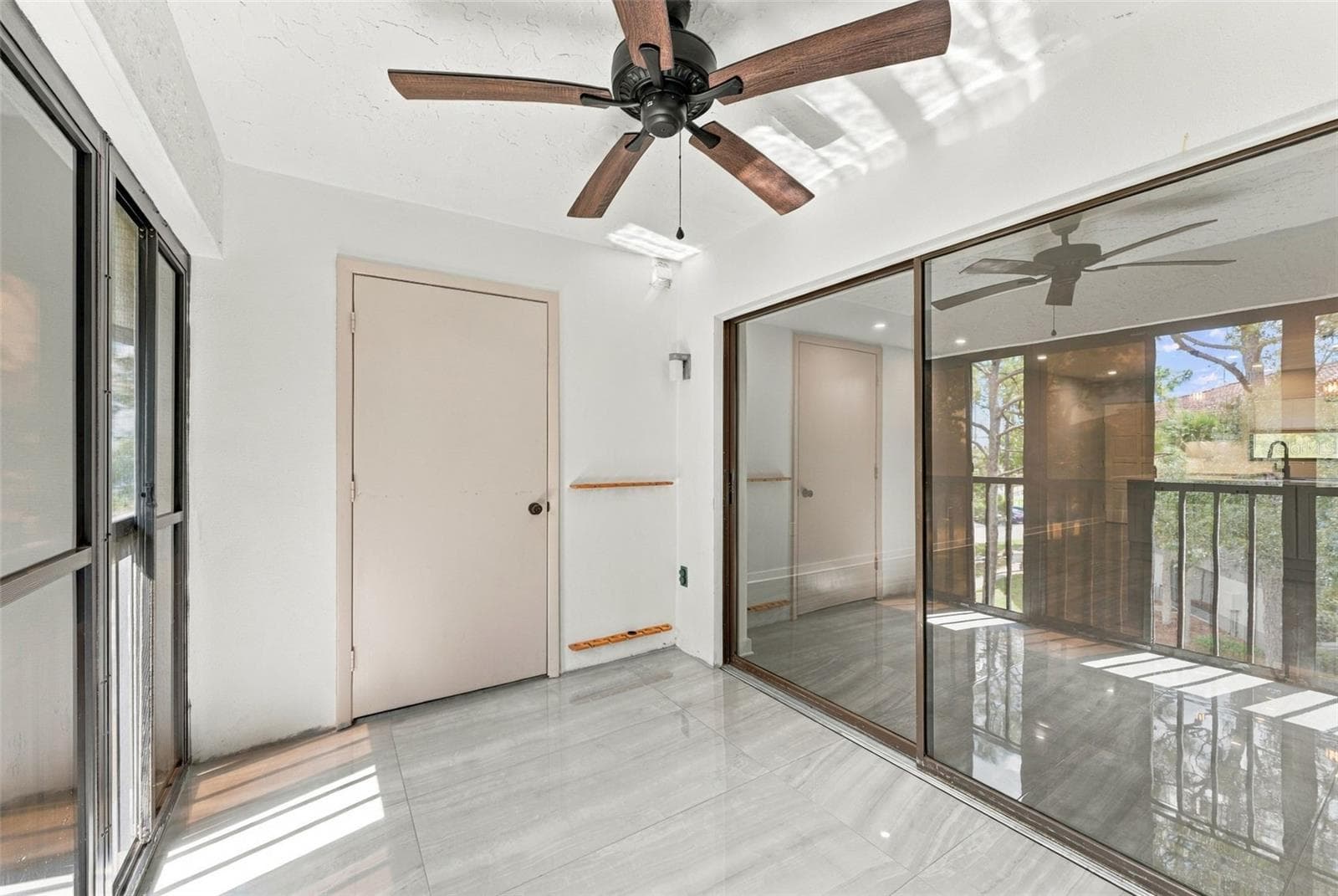 Private patio with a convenient additional storage closet - 2650 COUNTRYSIDE BLVD #A306, CLEARWATER