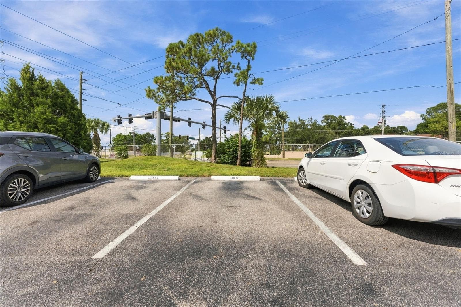 Convenient assigned parking space included with the unit - 2650 COUNTRYSIDE BLVD #A306, CLEARWATER