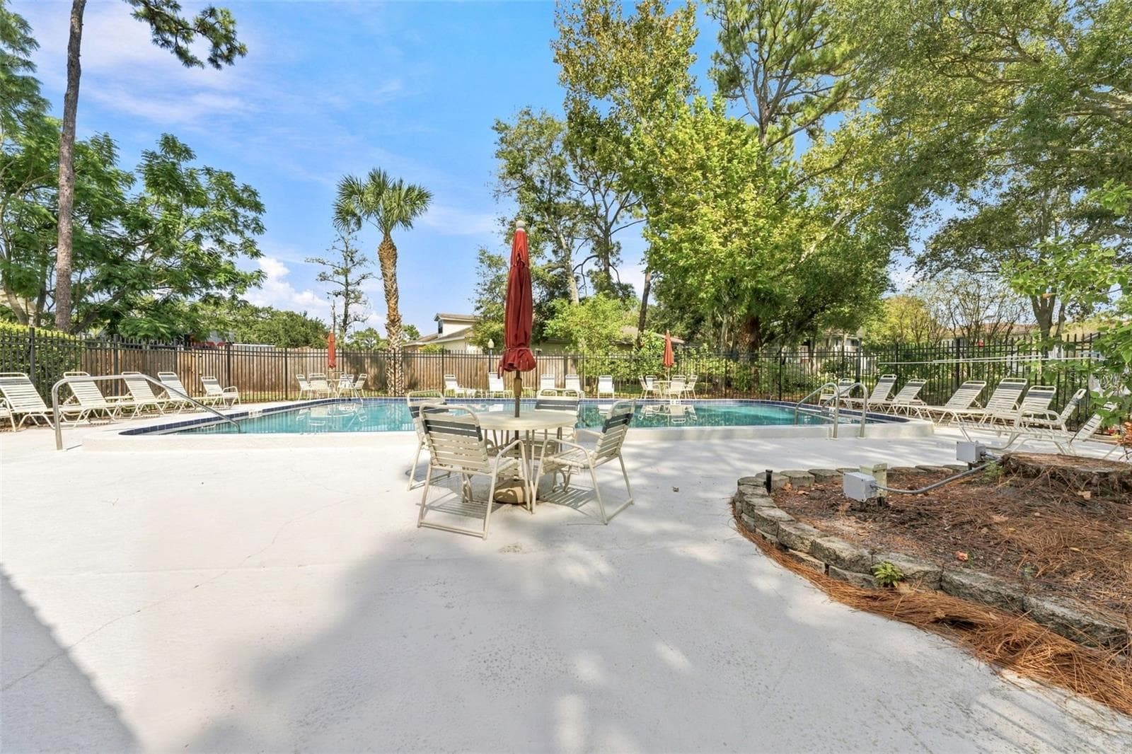 Large community pool perfect for relaxing and enjoying the Florida sunshine - 2650 COUNTRYSIDE BLVD #A306, CLEARWATER