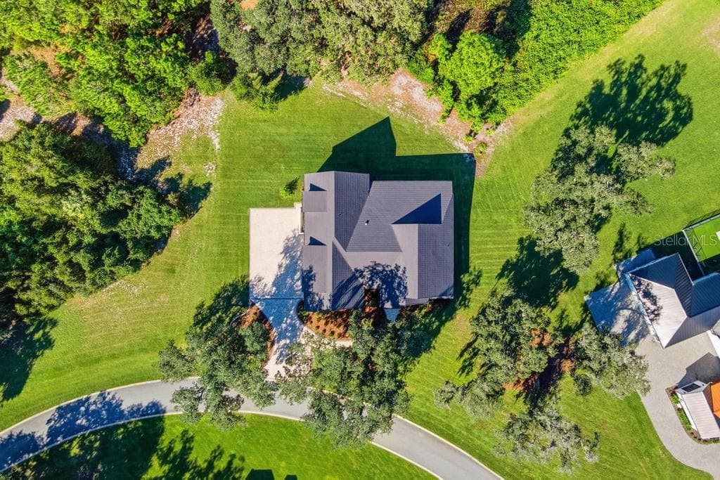 Home is situated on approximately 1.5 "high and dry" acreage... - 467 LONG AND WINDING RD, HOWEY IN THE HILLS