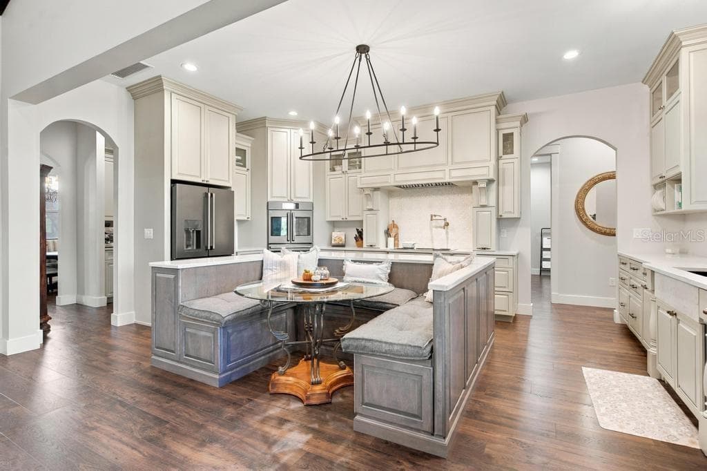 Kitchen features built in breakfast booth, with under seat storage! - 467 LONG AND WINDING RD, HOWEY IN THE HILLS