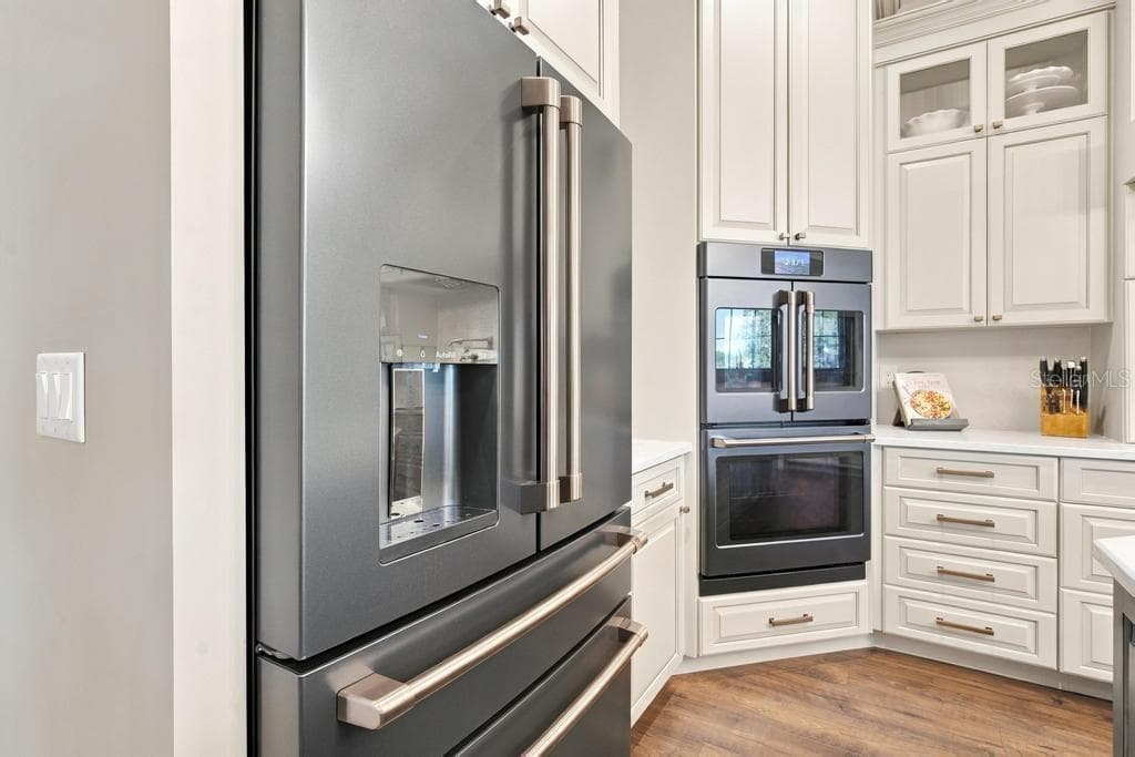 Love this four door refrigerator and dual convection/air fry ovens... - 467 LONG AND WINDING RD, HOWEY IN THE HILLS