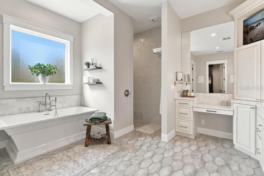 Luxury Primary Bath with separate shell shower - 467 LONG AND WINDING RD, HOWEY IN THE HILLS