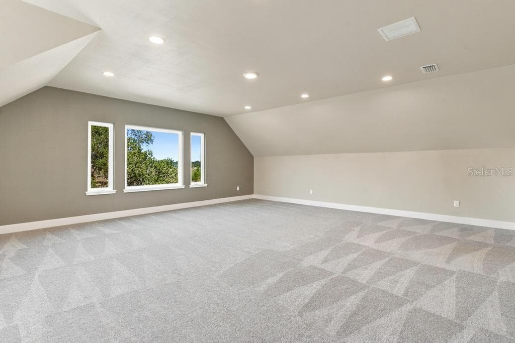 Fabolous elevated views of lake from family bonus room! - 467 LONG AND WINDING RD, HOWEY IN THE HILLS