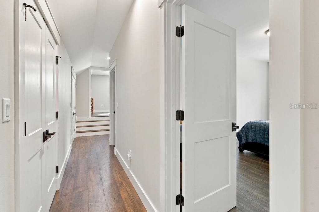 Hallway leads to bedrooms and walk-in closets! - 467 LONG AND WINDING RD, HOWEY IN THE HILLS