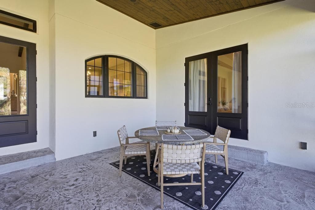 Additional seating space in your oversized porch... also a great area for future hot tub! - 467 LONG AND WINDING RD, HOWEY IN THE HILLS