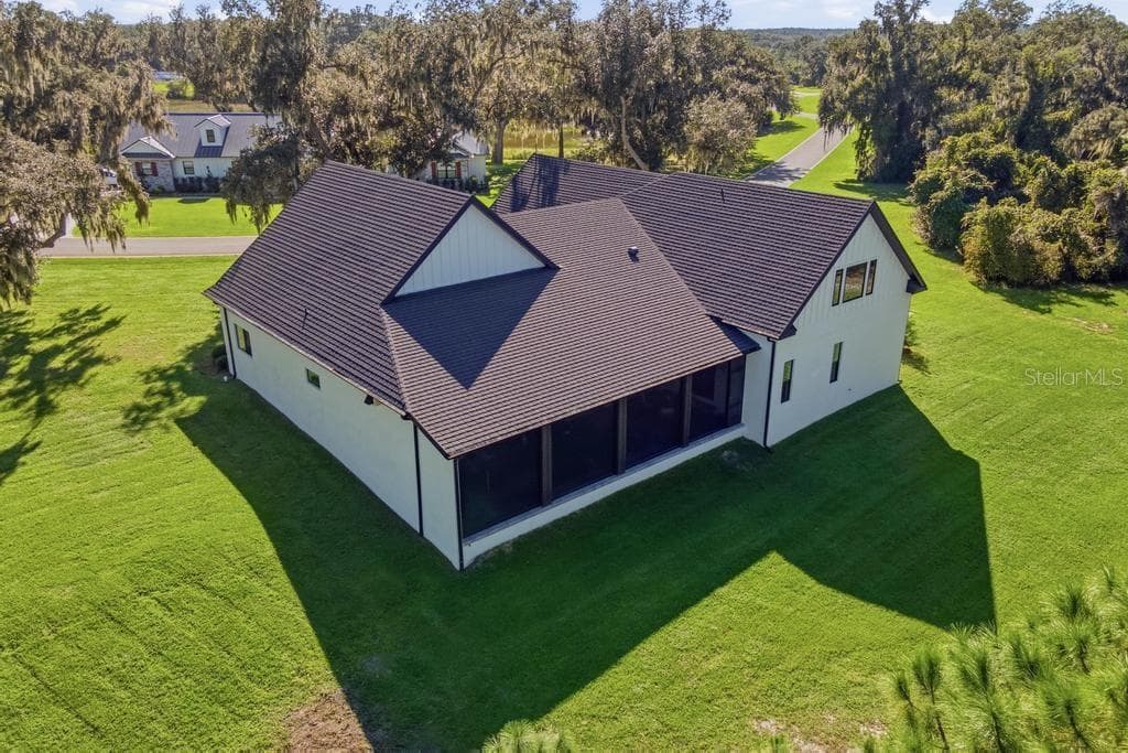Ariel of rear/side of this Estate Beauty! - 467 LONG AND WINDING RD, HOWEY IN THE HILLS