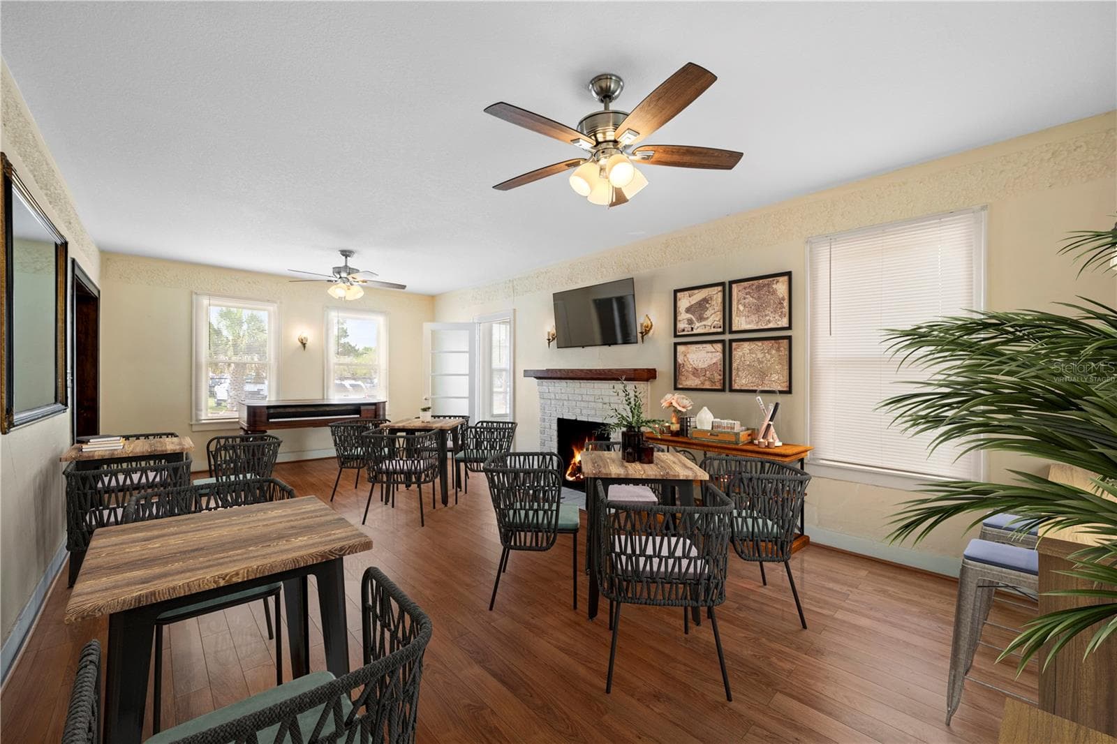 Living room (virtually staged as a cafe) - 1400 FLORIDA AVE, ST CLOUD