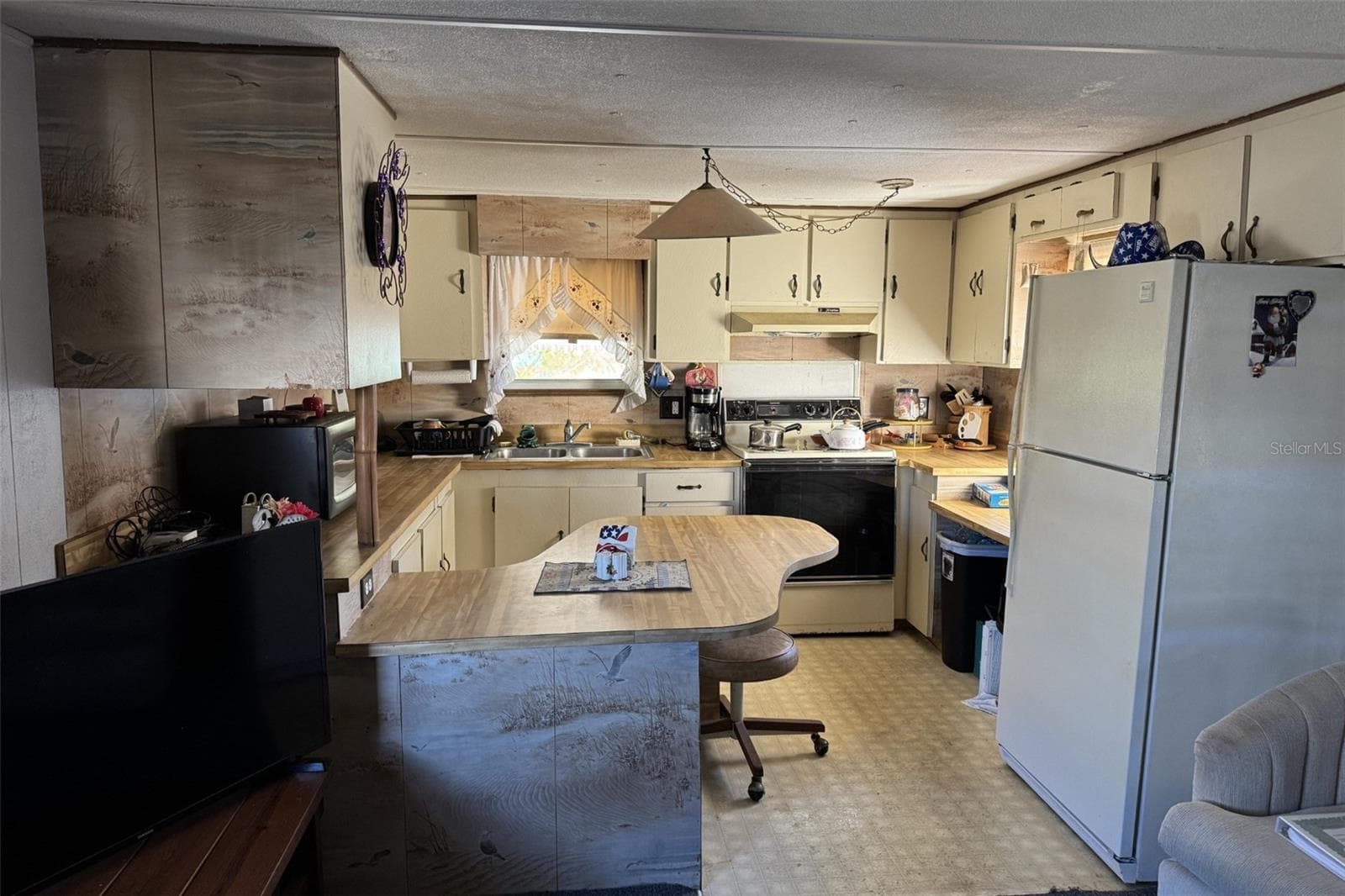 Mobile Home at 6720 PARK BLVD N #37, PINELLAS PARK, photo 5 of 23