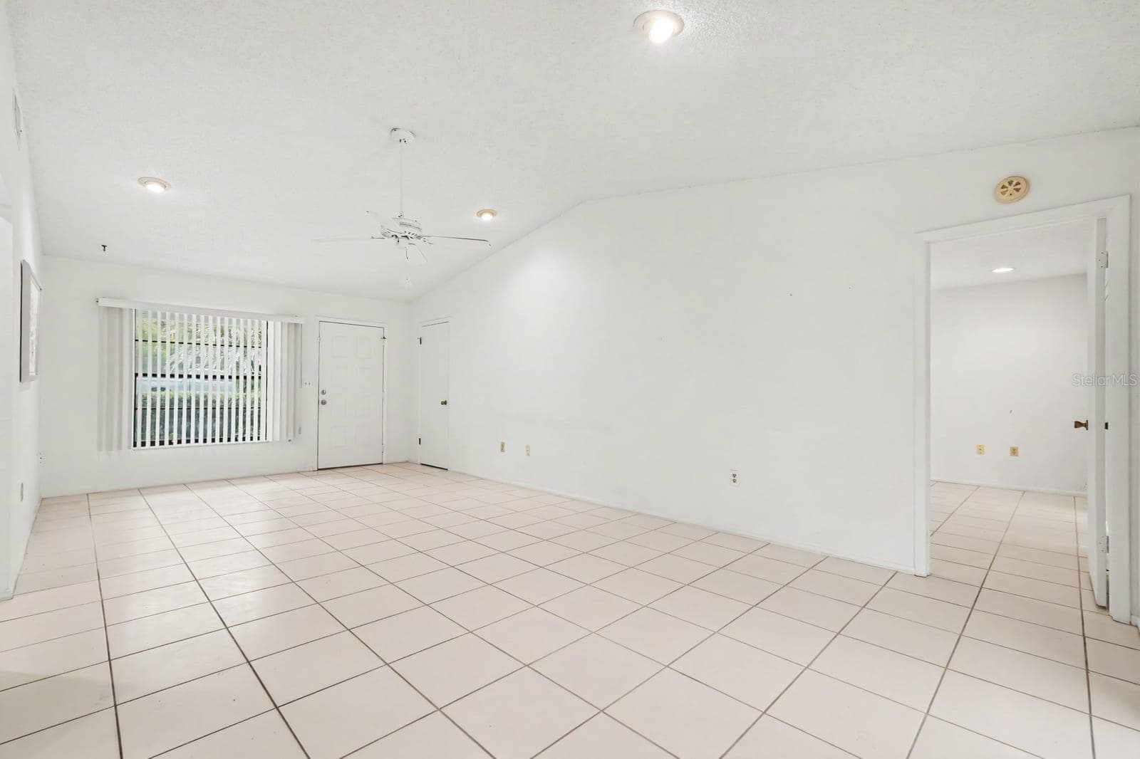 Spacious Room with Tile Flooring and Bright Natural Light from Windows - 12128 KATHERWOOD ST #20, SPRING HILL