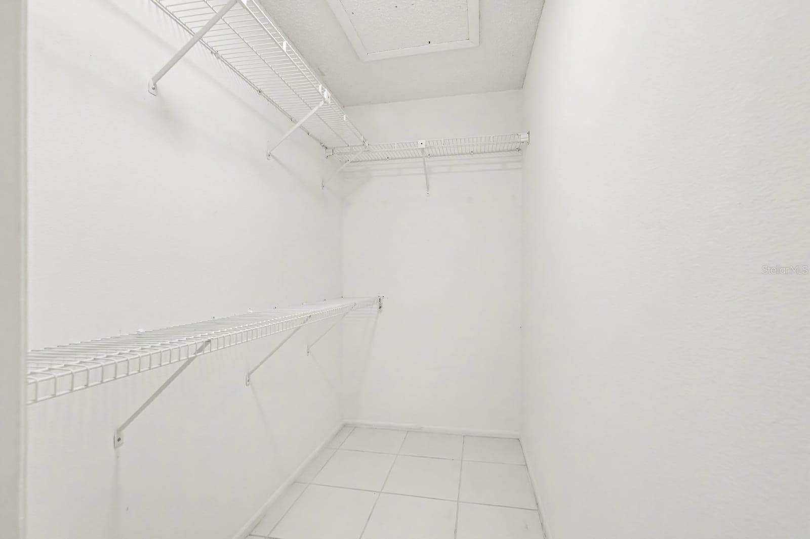 Dedicated Laundry Room with Wire Shelving for Storage Organization - 12128 KATHERWOOD ST #20, SPRING HILL