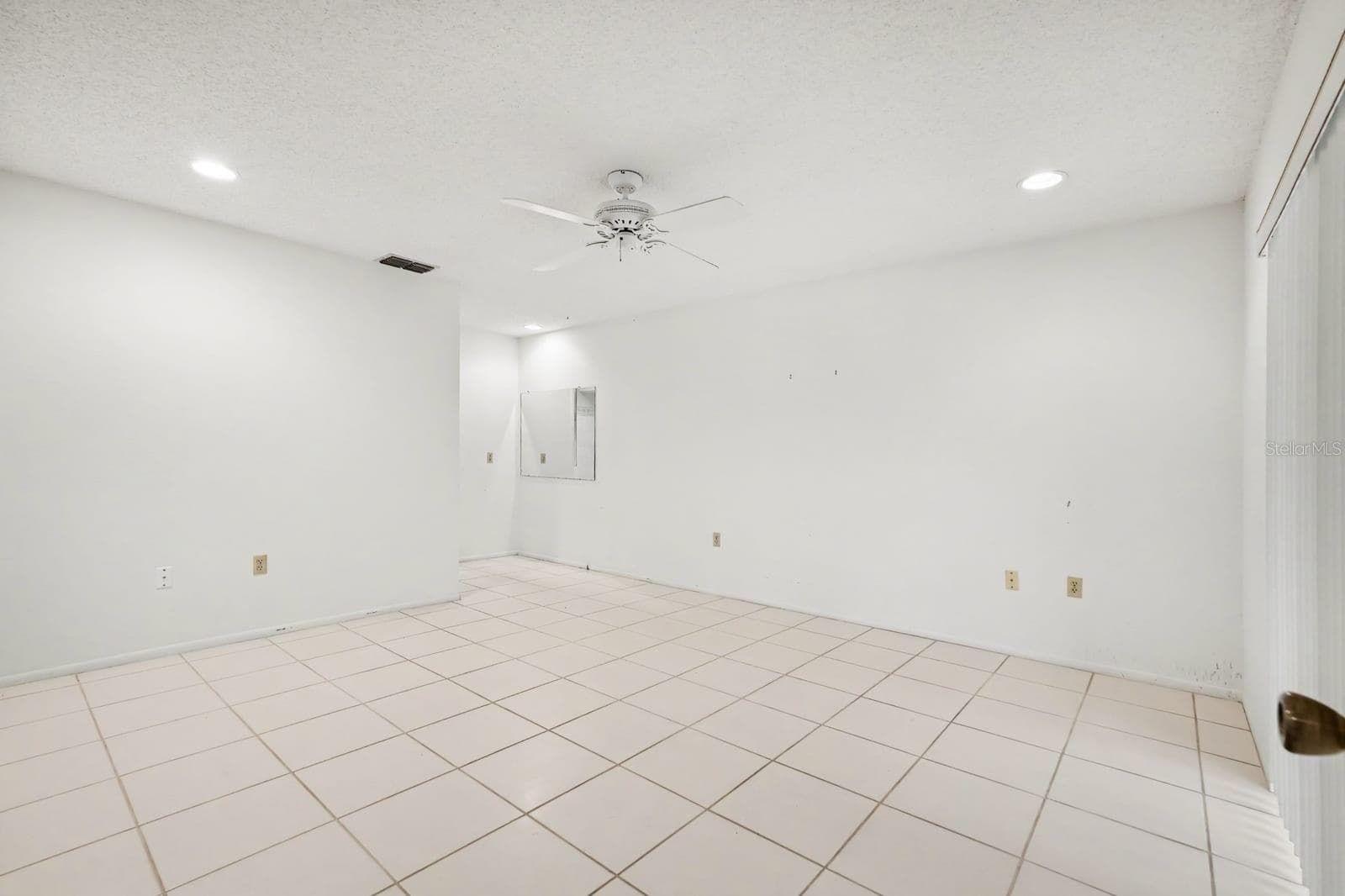 Spacious Secondary Bedroom with Tile Flooring and Multiple Electrical Outlets - 12128 KATHERWOOD ST #20, SPRING HILL