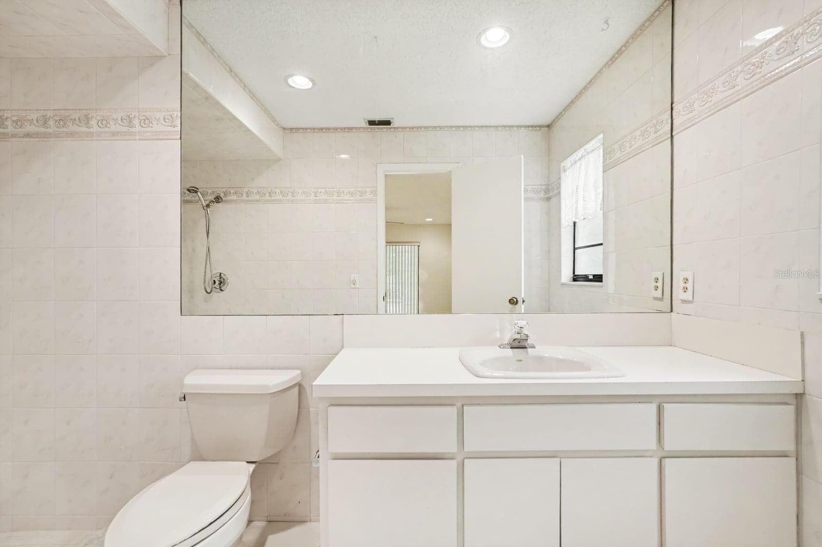 Elegant Master Bath with Vanity, Tile Work, and Walk-In Shower - 12128 KATHERWOOD ST #20, SPRING HILL