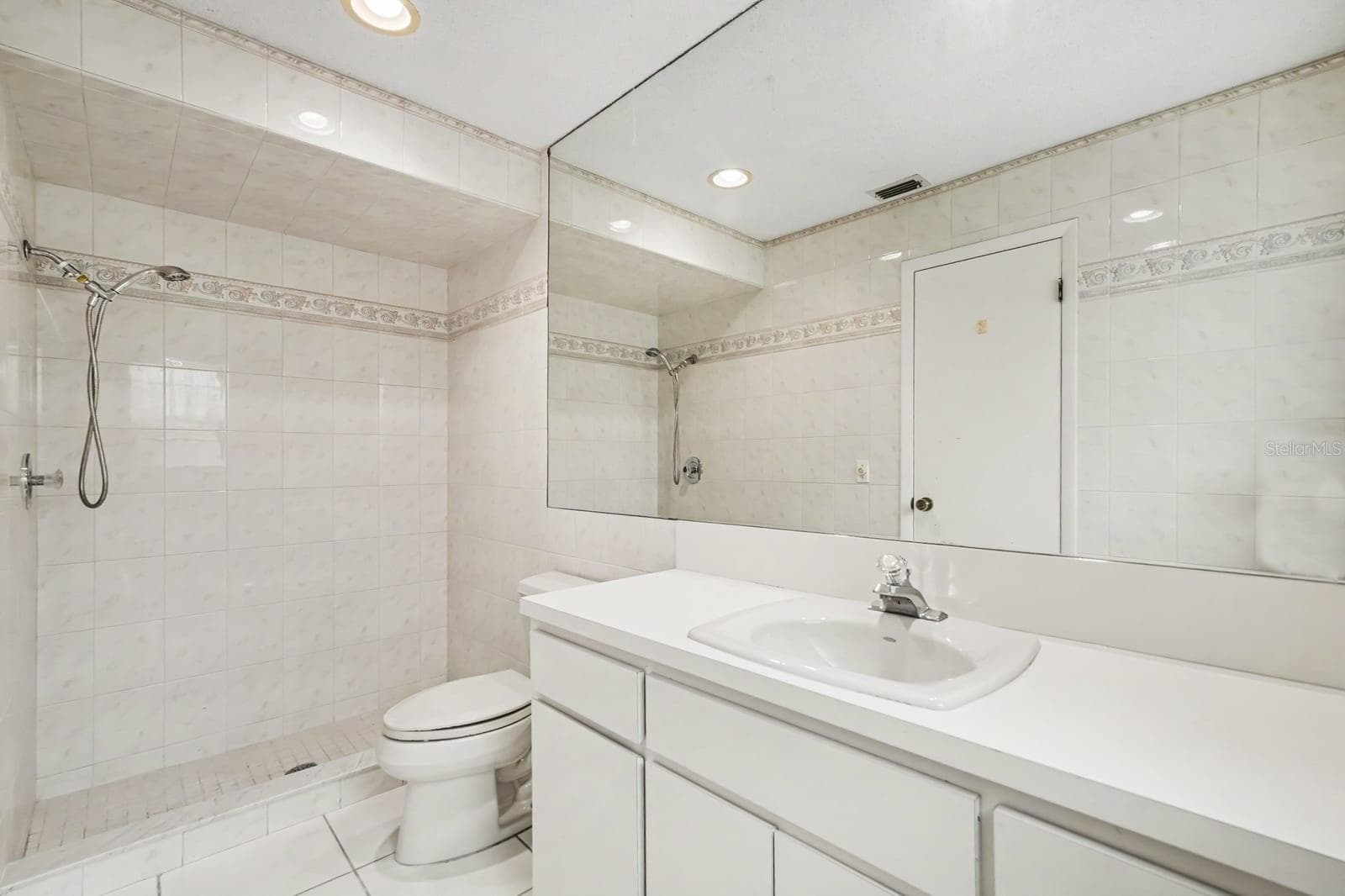 Master Bath with Large Mirror, Double Sink, and Separate Shower - 12128 KATHERWOOD ST #20, SPRING HILL