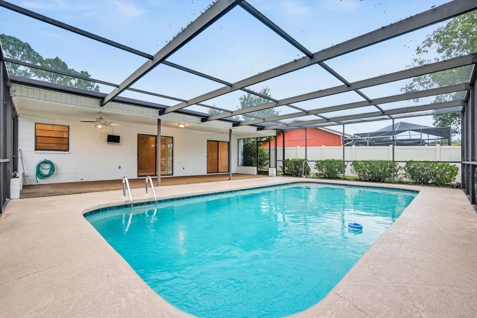 Indoor Pool Area with Polycarbonate Roof and Ample Lounging Space - 12128 KATHERWOOD ST #20, SPRING HILL
