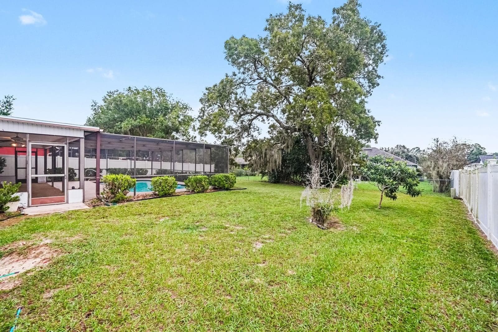 Expansive Landscaped Yard with Mature Trees and Pool Enclosure - 12128 KATHERWOOD ST #20, SPRING HILL