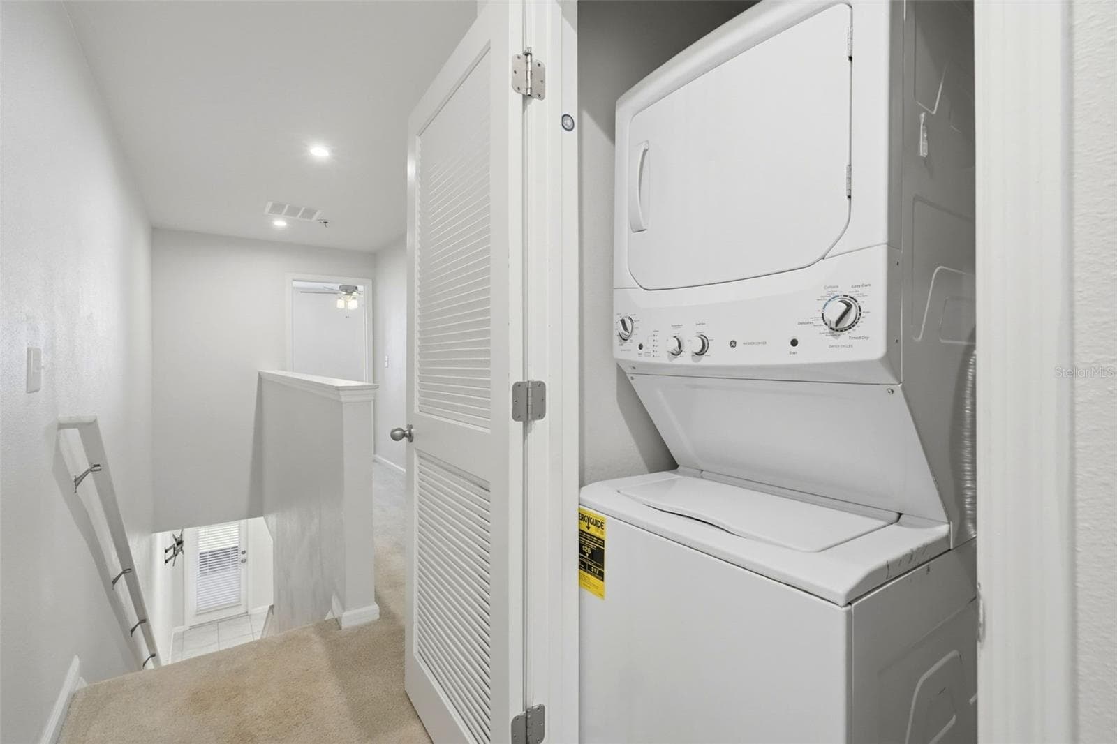 Laundry closet in btwn bedrooms 2 & 3 - 4167 HARBOUR PALM DR, HOLIDAY