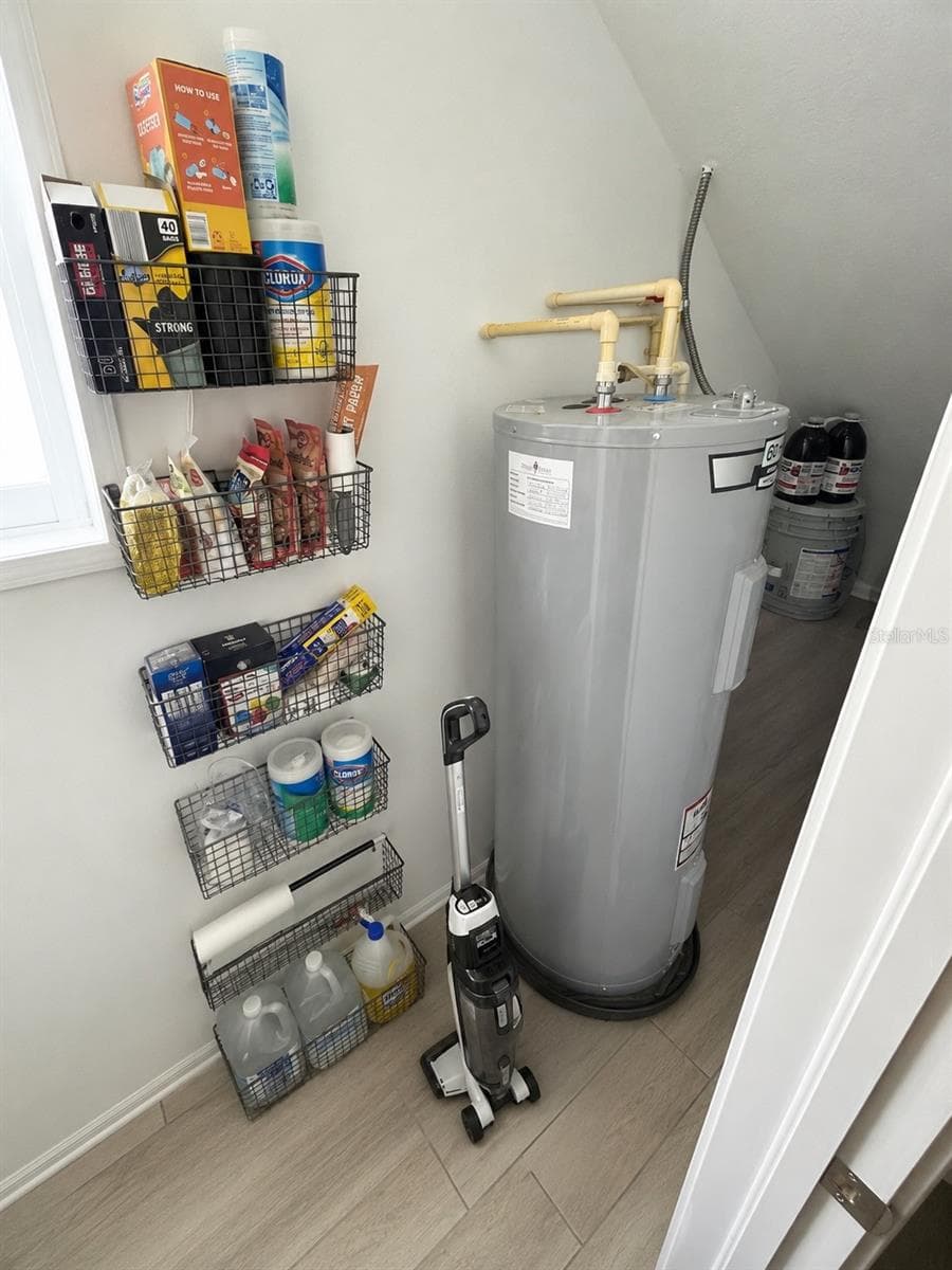 Kitchen pantry and storage under the stairs. - 3006 N MORGAN ST, TAMPA