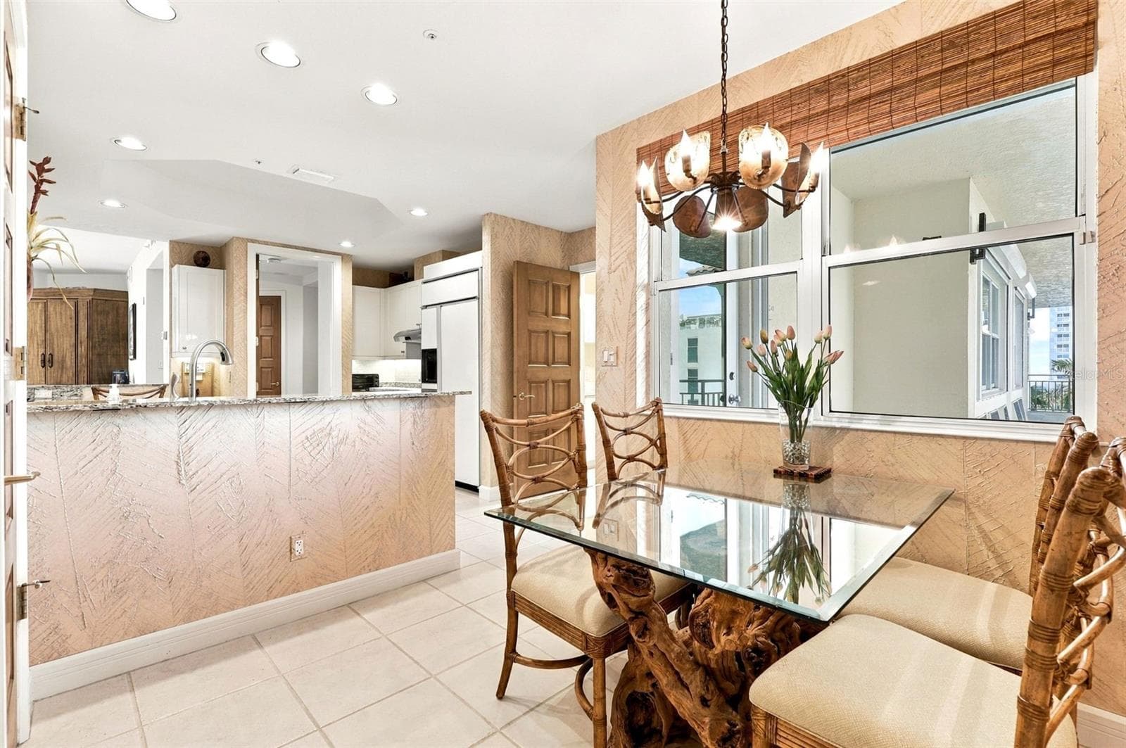 Breakfast nook with large picture window. - 2185 GULF OF MEXICO DR #243, LONGBOAT KEY