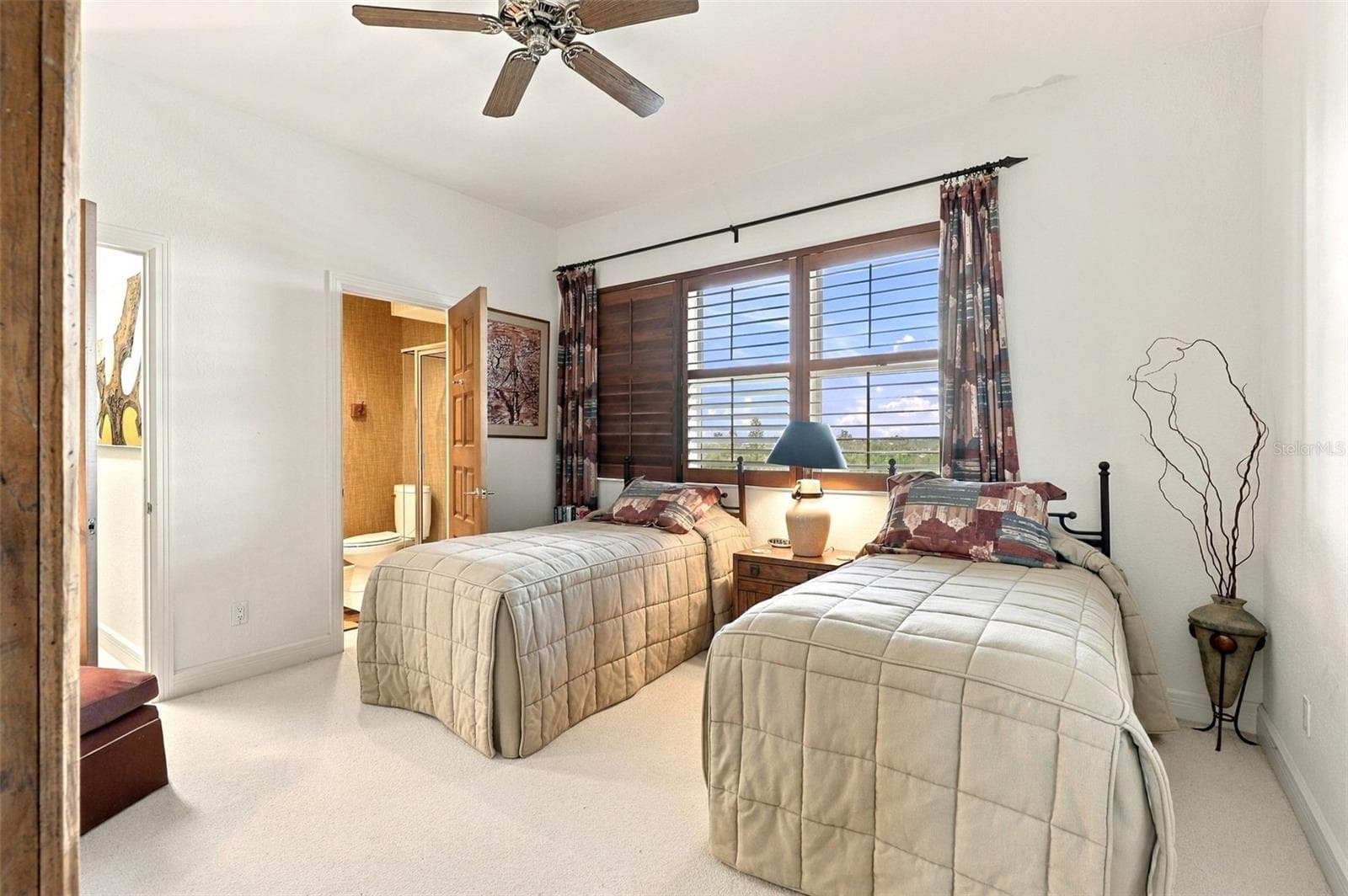 Bedroom 2 offers a walk-in closet and ensuite bath. - 2185 GULF OF MEXICO DR #243, LONGBOAT KEY