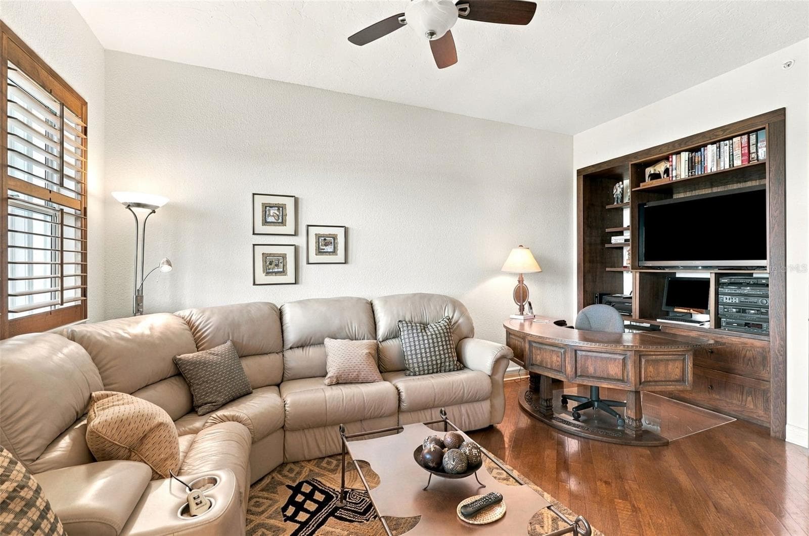 The built-in shelving could be easily converted back to a closet if needed. - 2185 GULF OF MEXICO DR #243, LONGBOAT KEY
